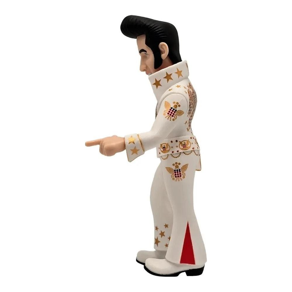 Figura de Elvis Presley con traje blanco, estrellas doradas, señalando izq.