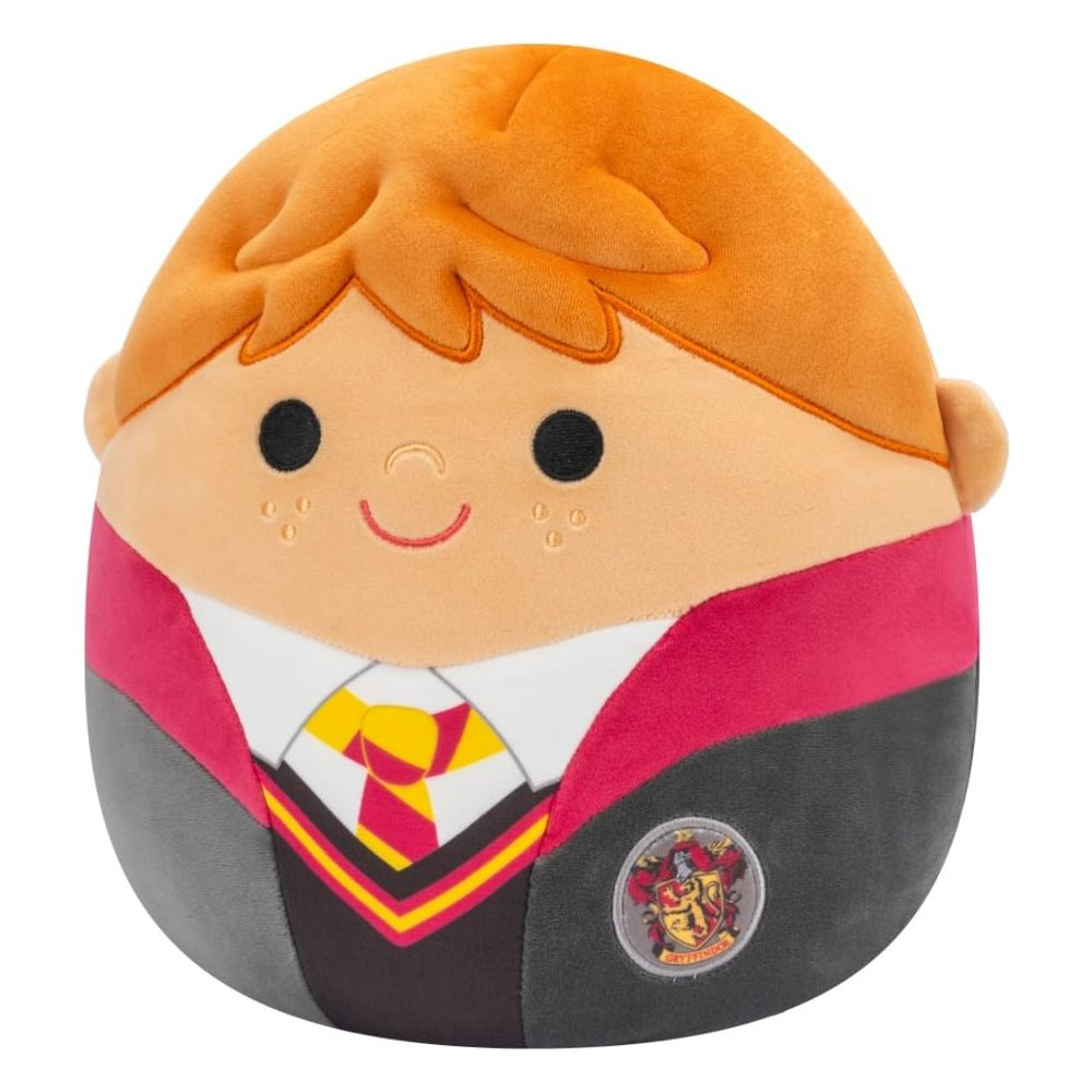 Peluche con capelli arancioni, lentiggini e uniforme Grifondoro.