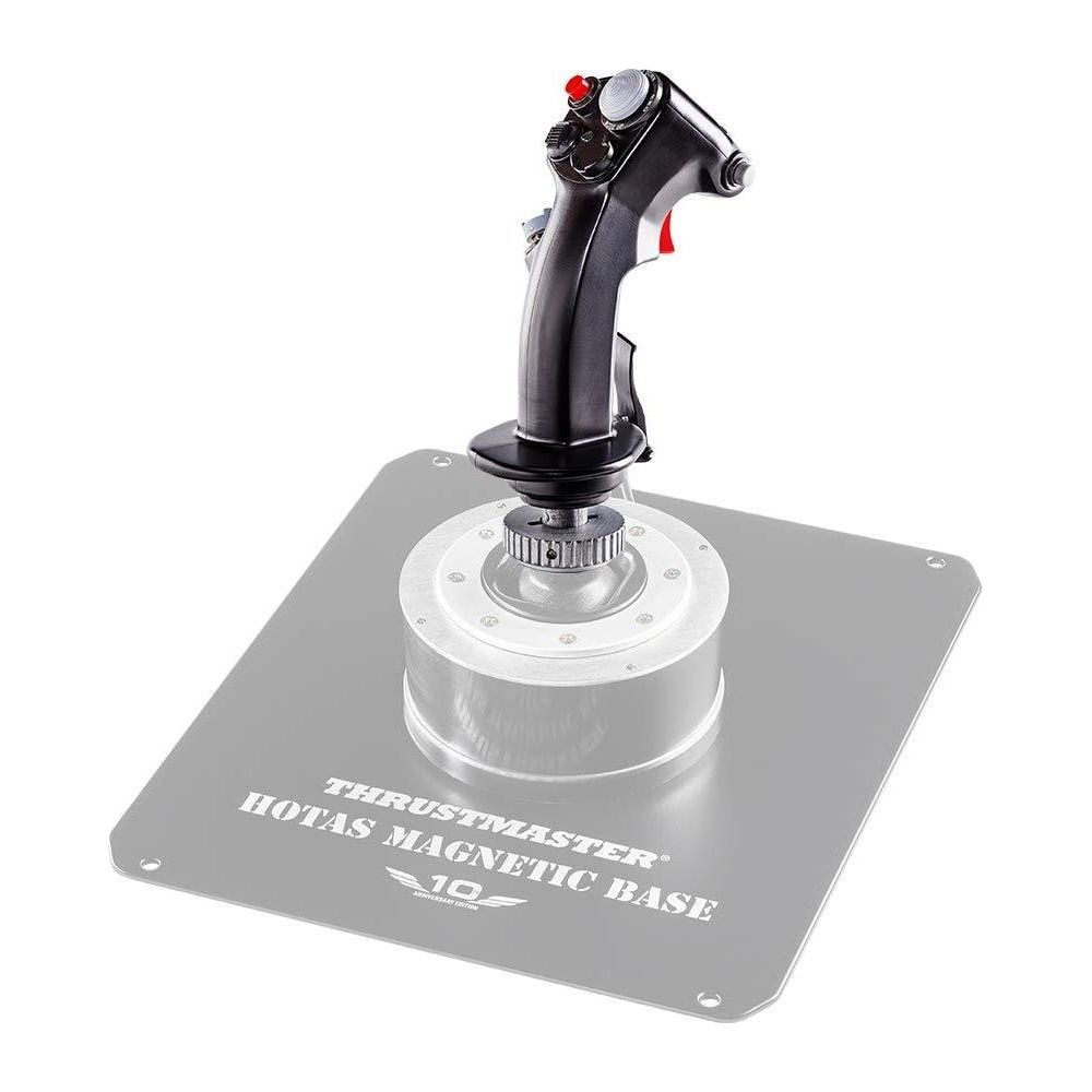 A black flight simulator joystick with a red button on a silver base with text.
