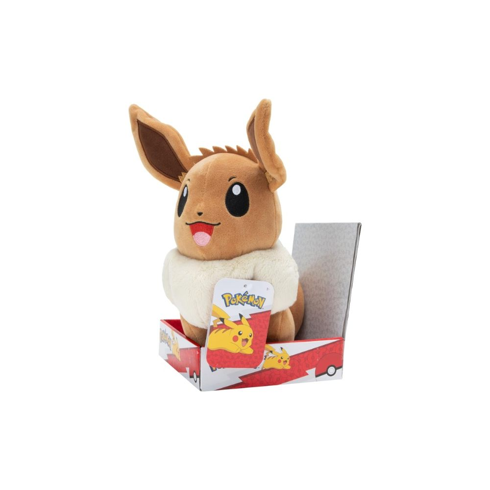 Brauner Evoli-Plüsch mit weißem Kragen sitzt in einer Box mit Pikachu-Motiv.