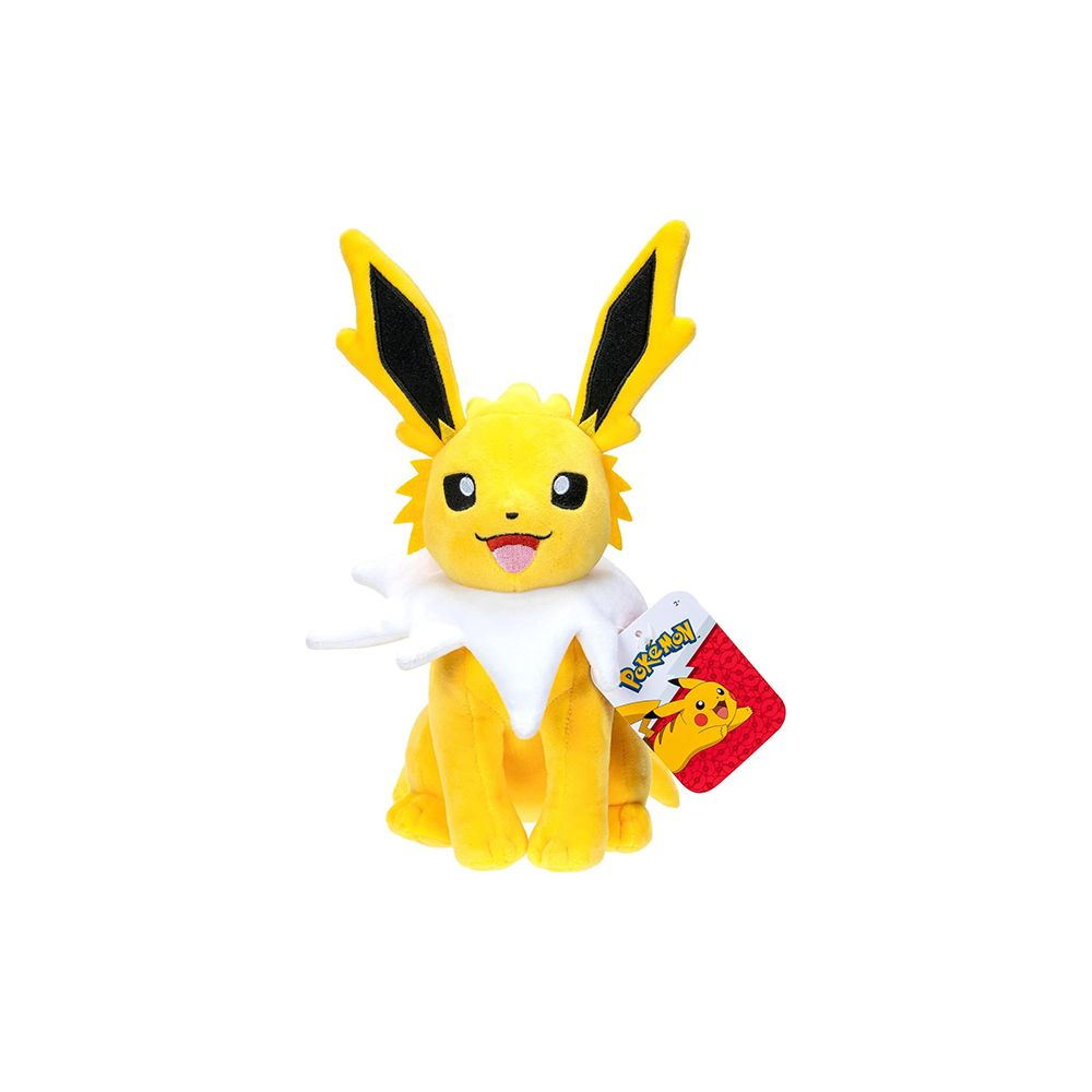 Une peluche jaune de Jolteon Pokémon avec des oreilles noires et un col blanc.