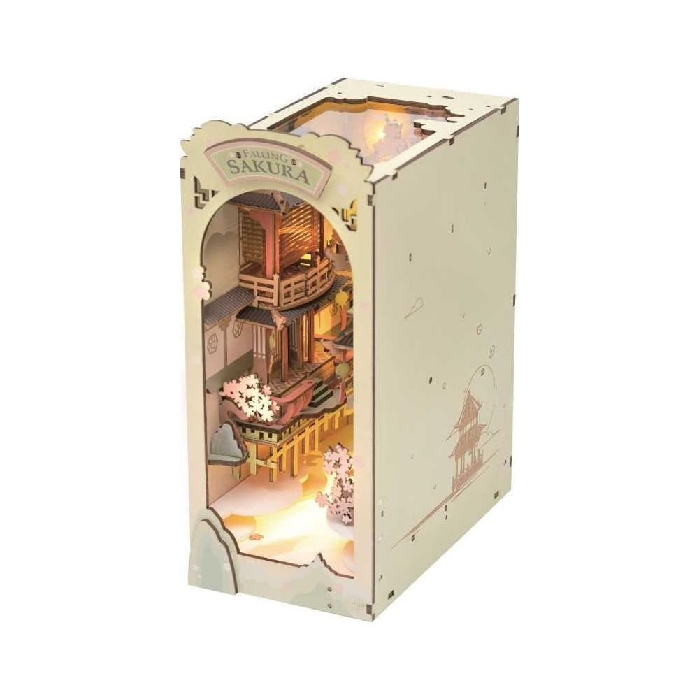 Sakura ağaçları ve geleneksel bir binayı içeren ahşap diorama.