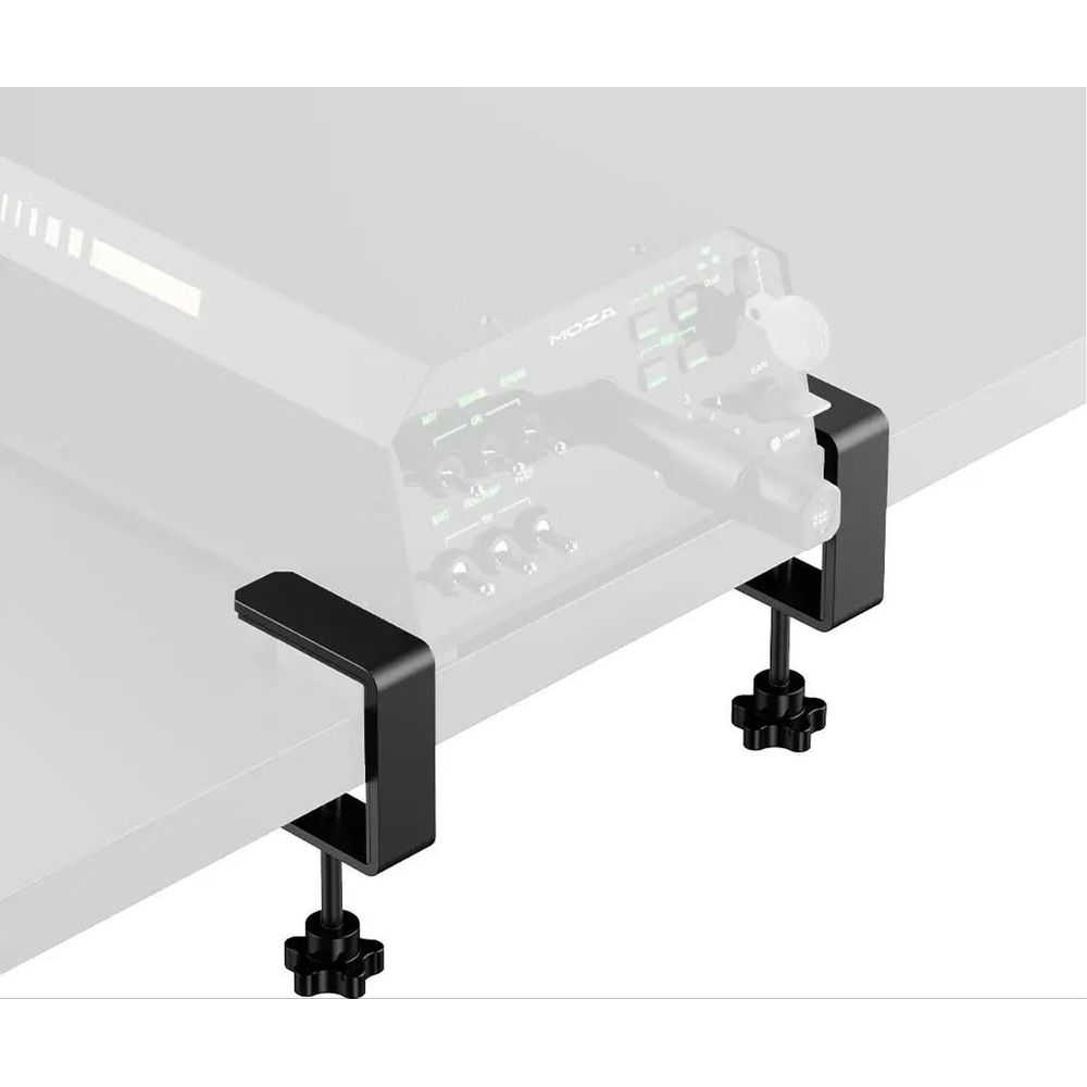 Two black clamps with star knobs secure a black device on a table.
