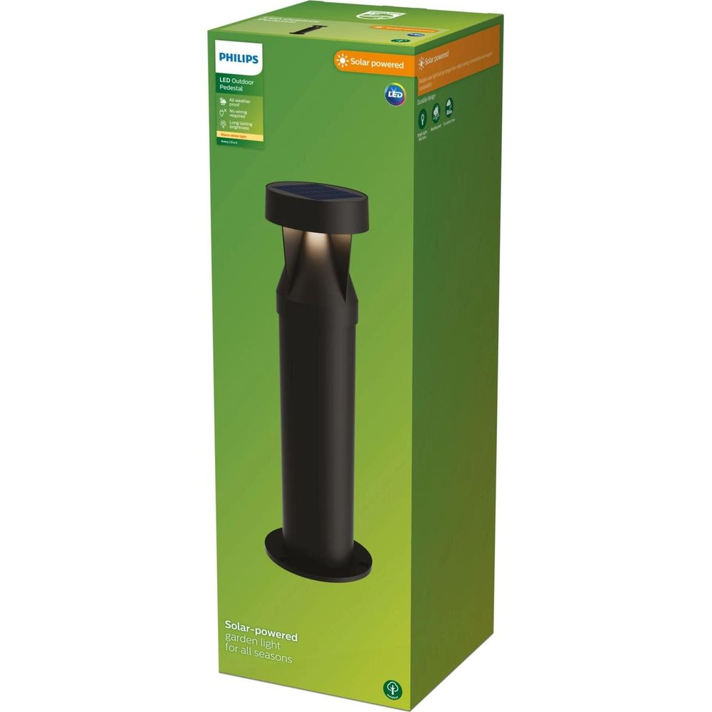 Schwarze Solar-Gartenleuchte mit Philips-Logo auf grünem Karton.
