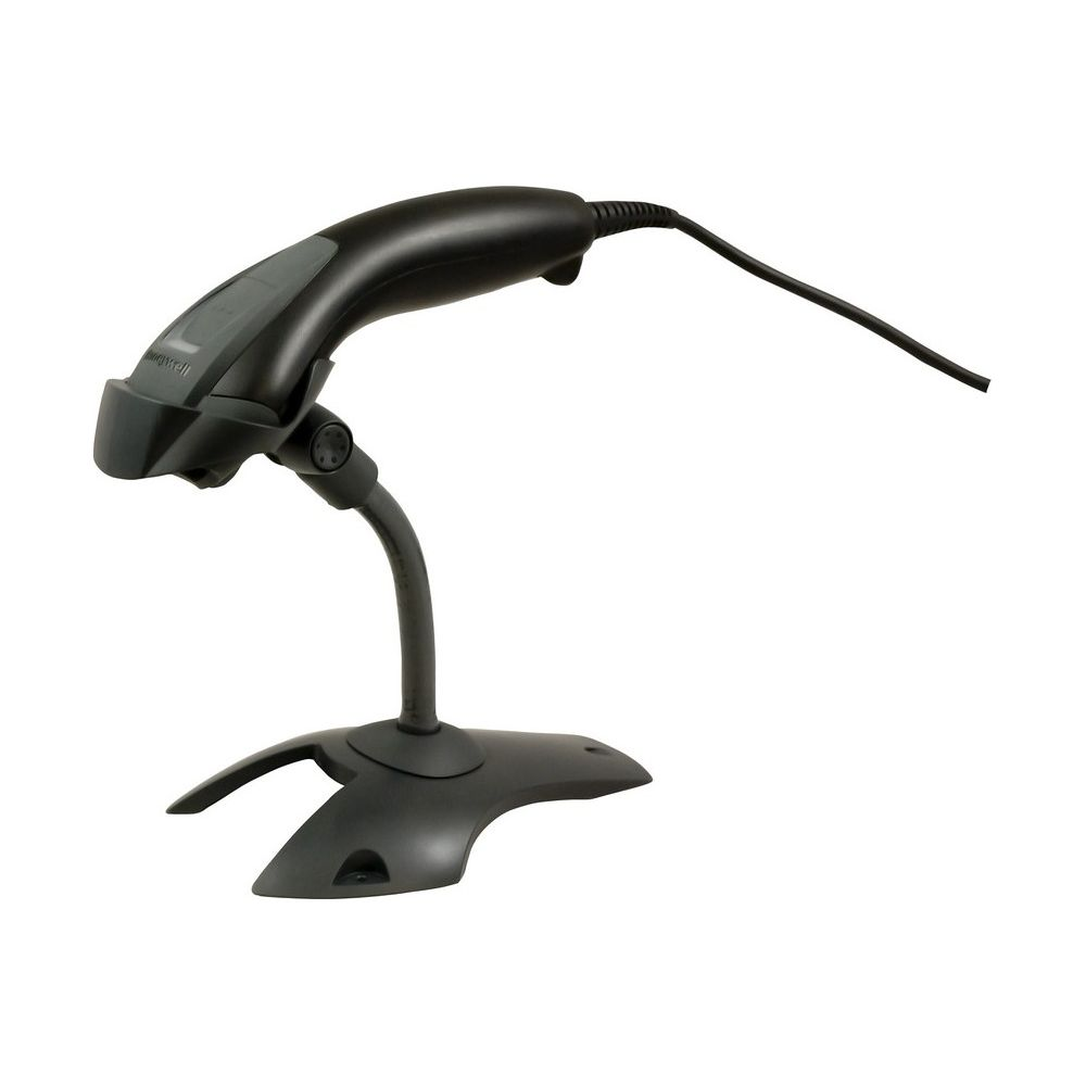 Uno scanner di codici a barre Honeywell nero con cavo su un supporto.