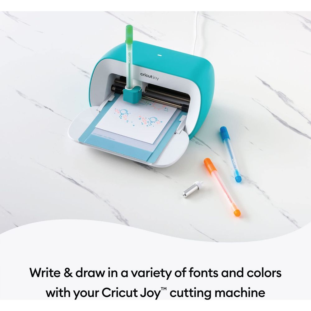 Türkisblaue Cricut Joy Schneidemaschine mit Stiften und Klinge