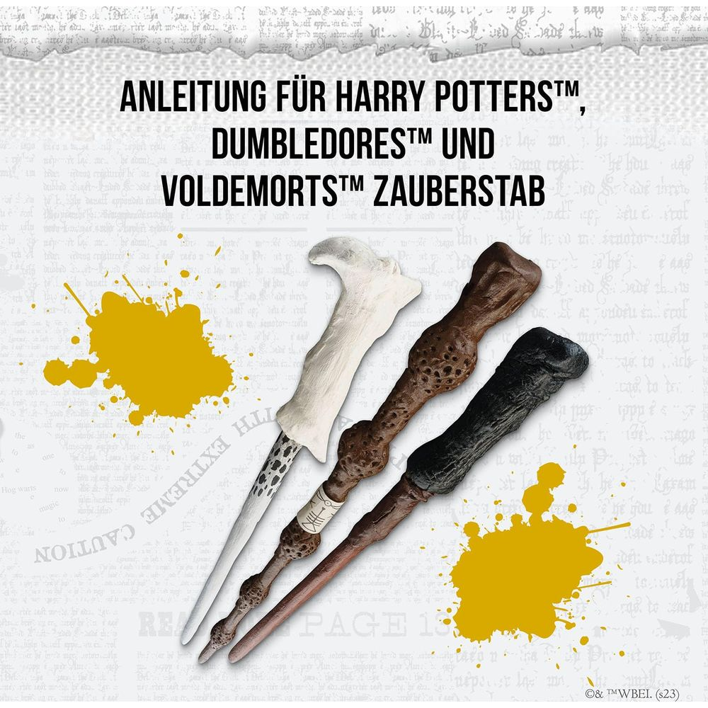 Trzy różdżki: biała, brązowa, czarna, z żółtymi plamami i tekstem.
