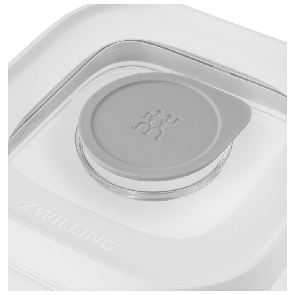 Tapa gris con logo Zwilling en recipiente blanco.