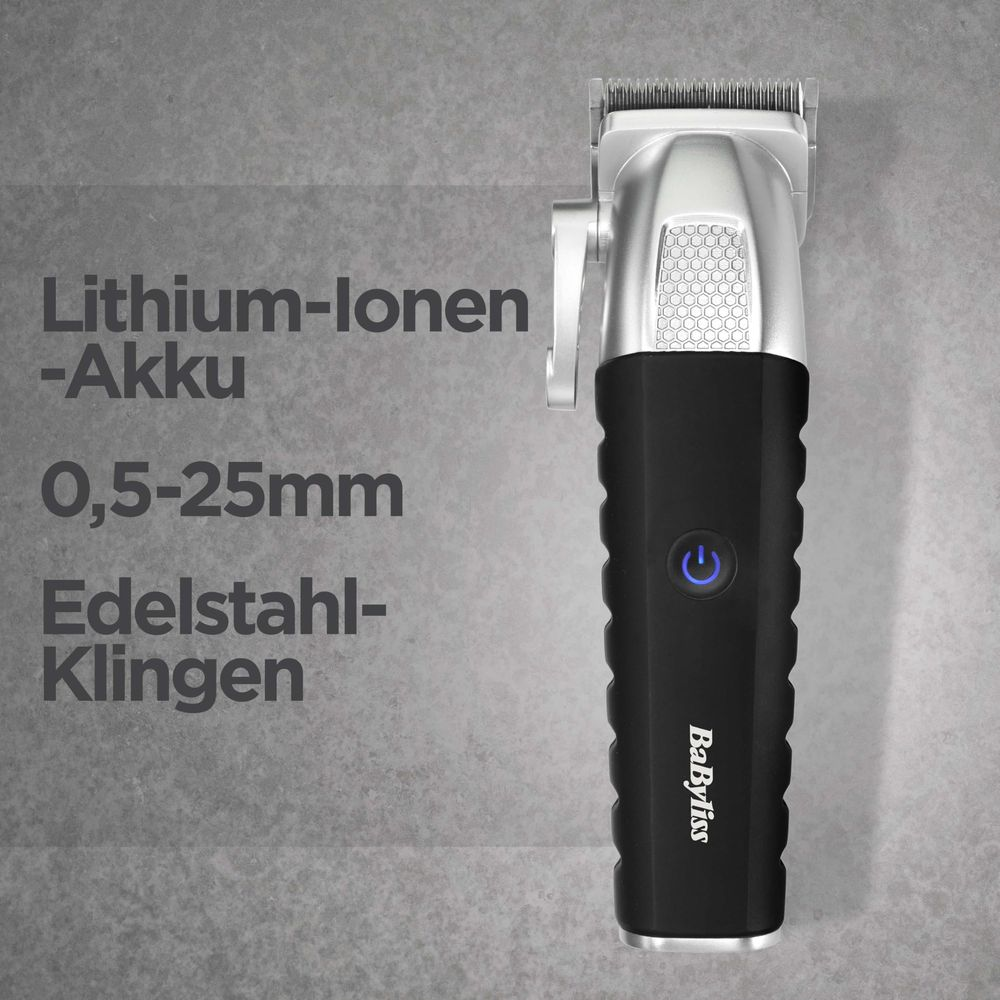 Schwarzer Haarschneider mit silbernem Kopf und blauem Power-Knopf.