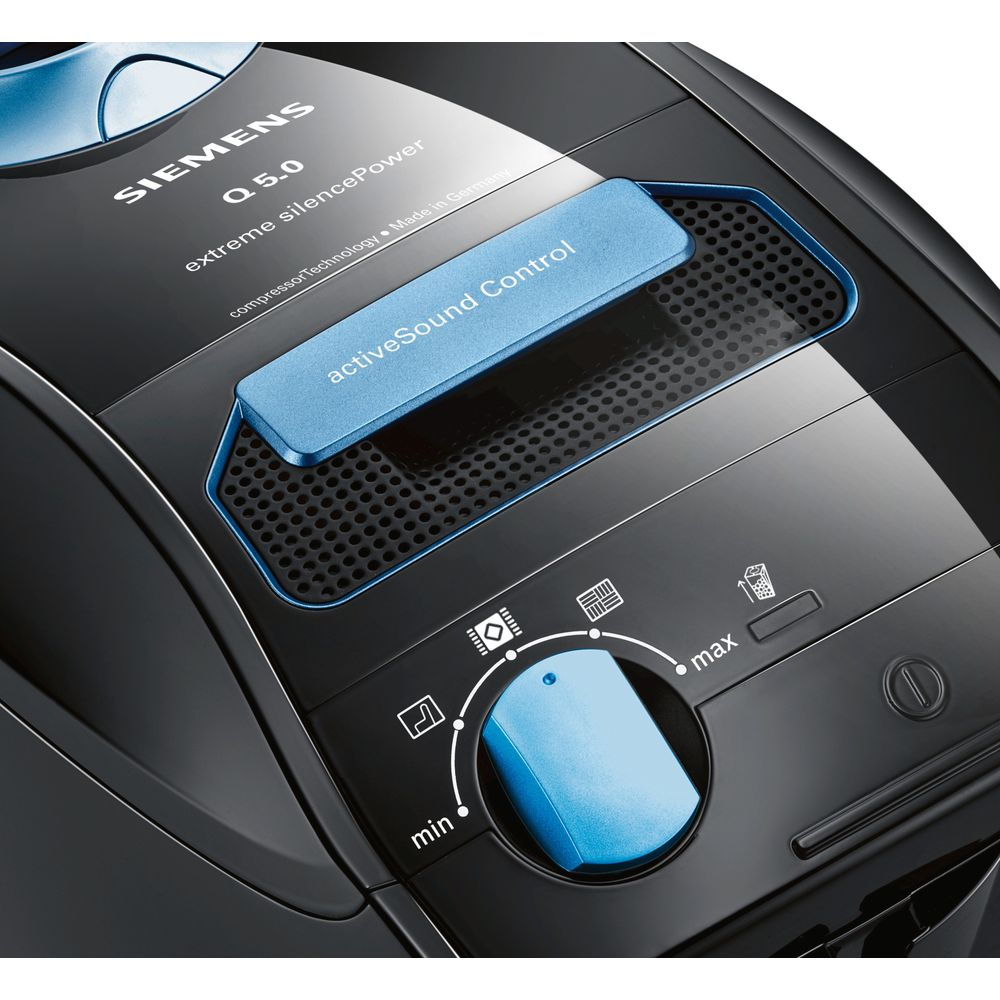 Odkurzacz Siemens z niebieskim pokrętłem do ustawień mocy.