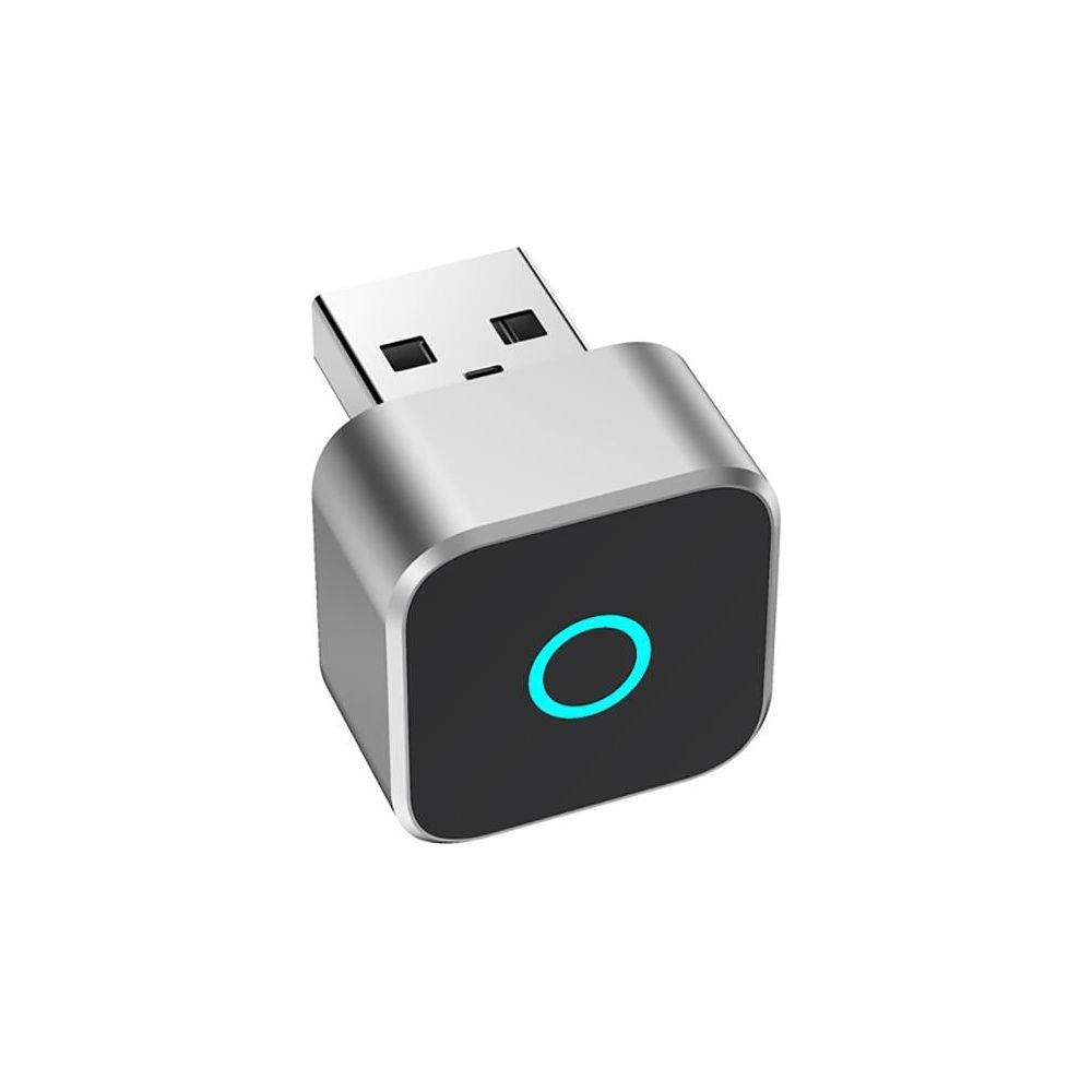 Un dongle USB argentato con un'icona a cerchio blu su sfondo nero.