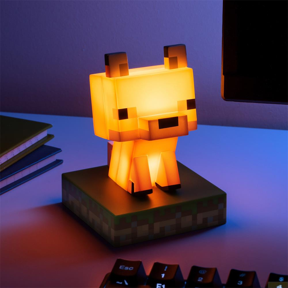 Ein leuchtender Minecraft-Wolf steht auf einem Block mit Graspixeln.