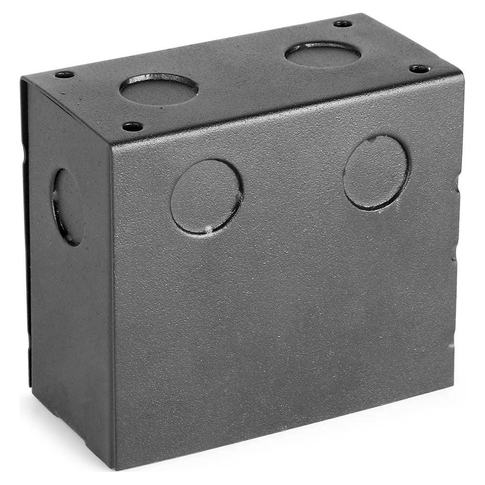 Una caja de metal oscura con perforaciones redondas en los lados y la parte superior.
