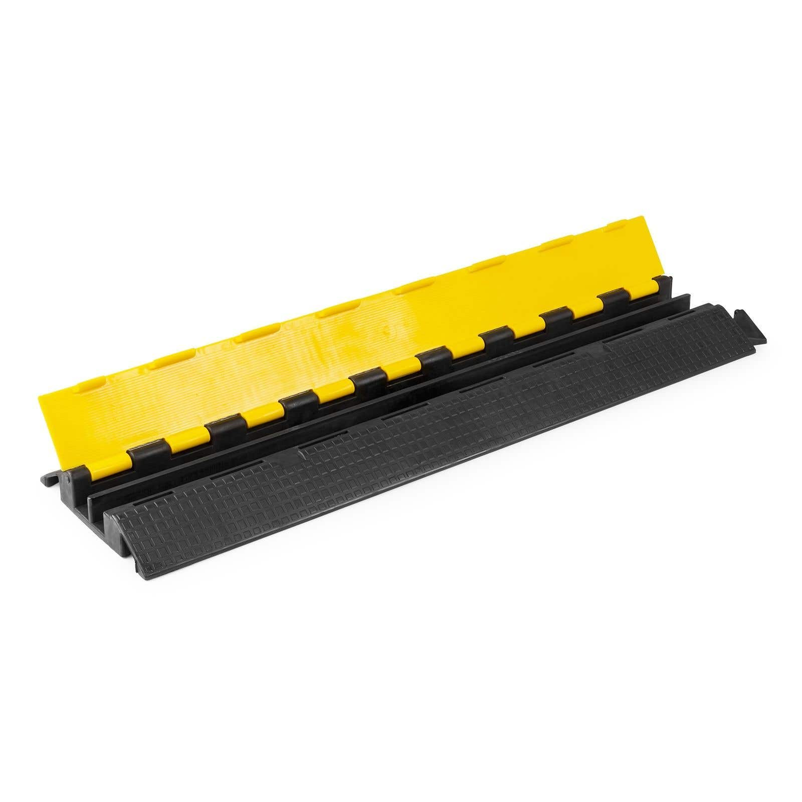 Una rampa protectora de cables amarilla con base negra y conectores de goma.