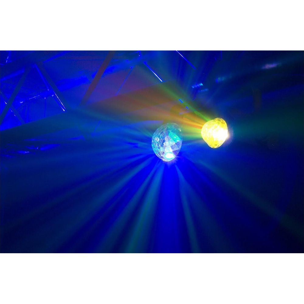 Dos luces, bola de discoteca y luz amarilla, emiten rayos azules y amarillos.