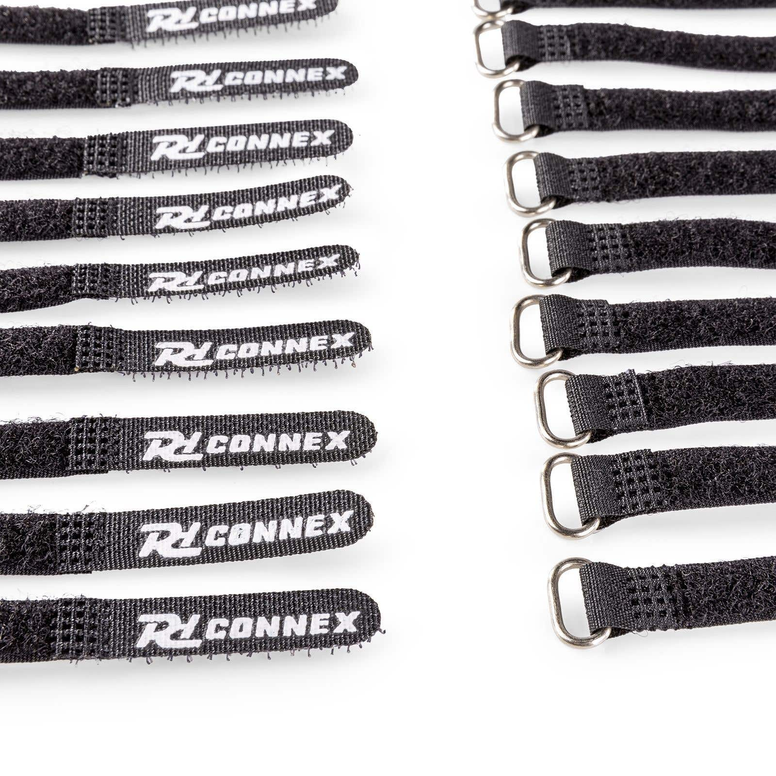 Correas de velcro negras con anillos plateados y logo blanco, sobre fondo blanco.
