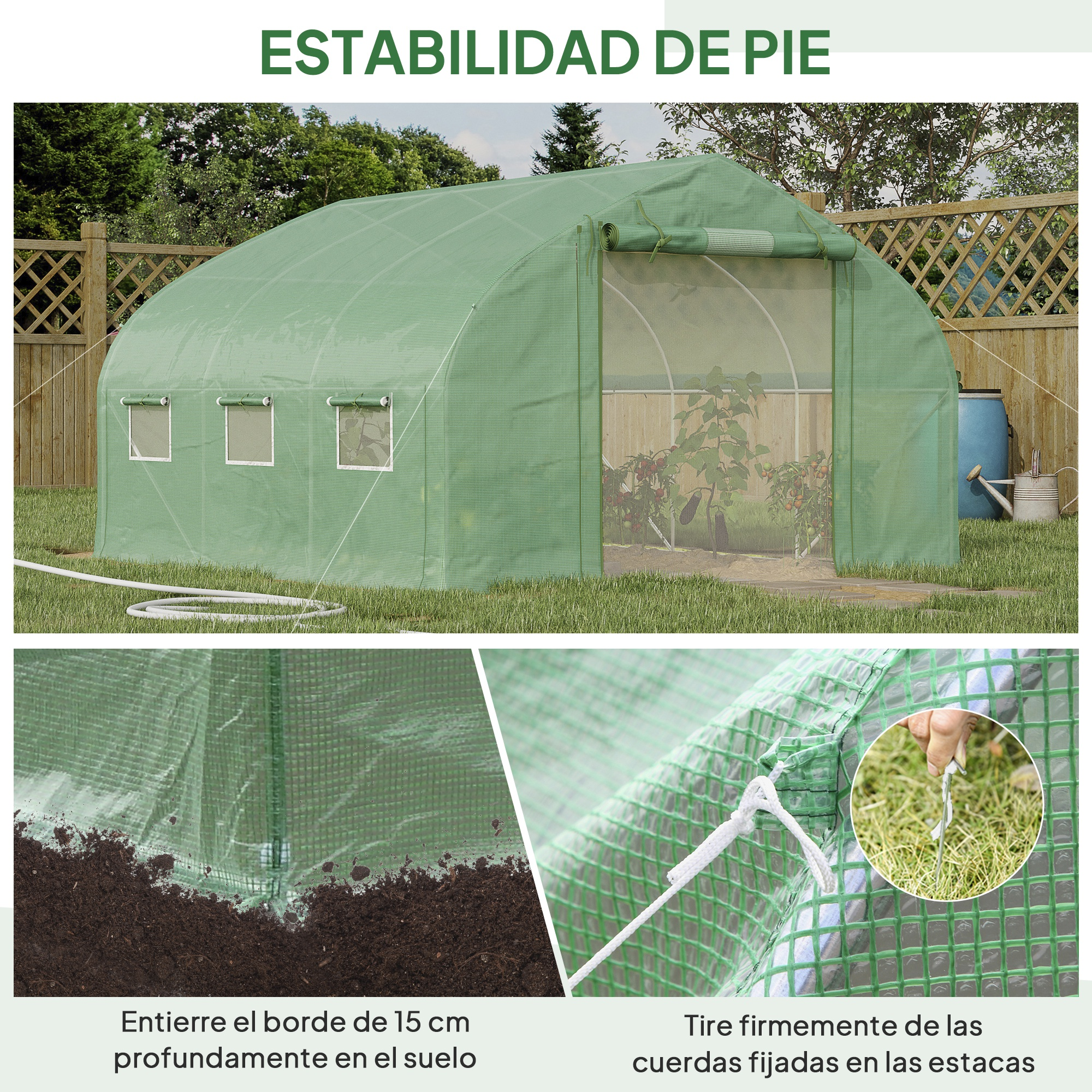 Invernadero verde con ventanas y puerta, junto a valla de madera y cubo azul.