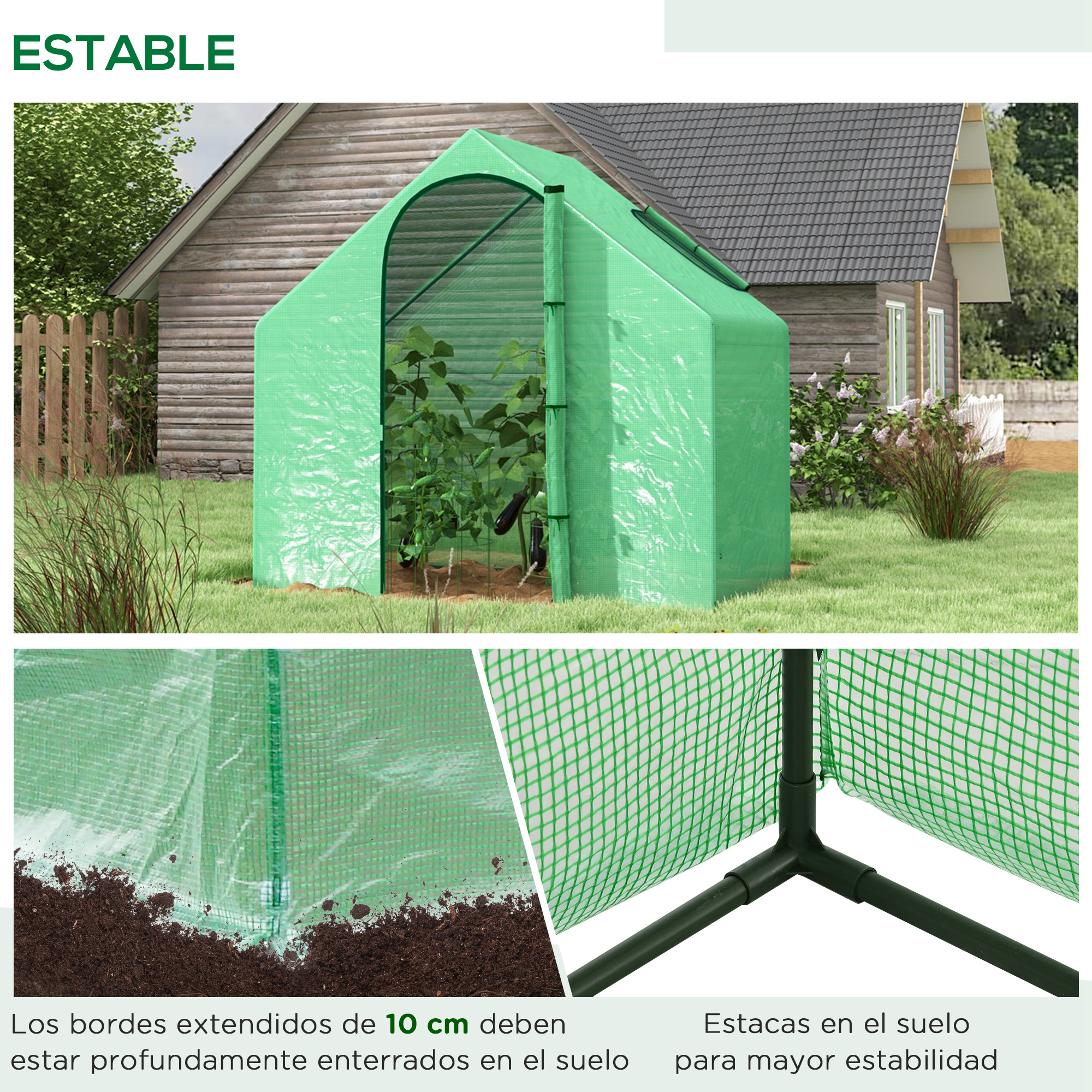 Un invernadero verde en un jardín junto a una casa de madera.