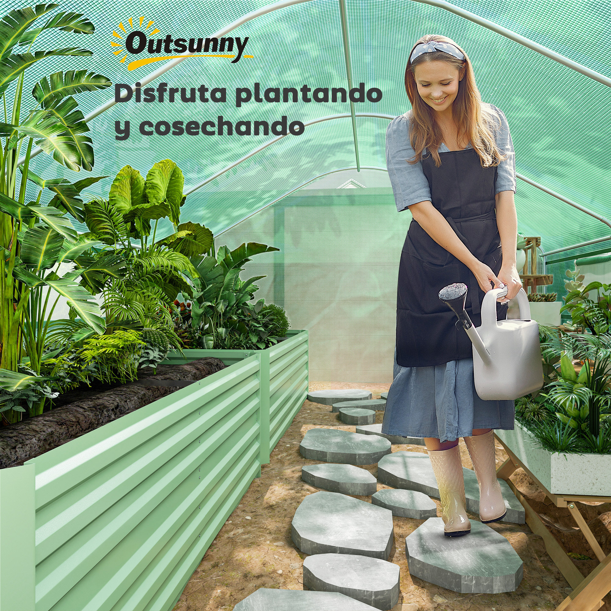 Mujer regando plantas en un invernadero con bancales y piedras.