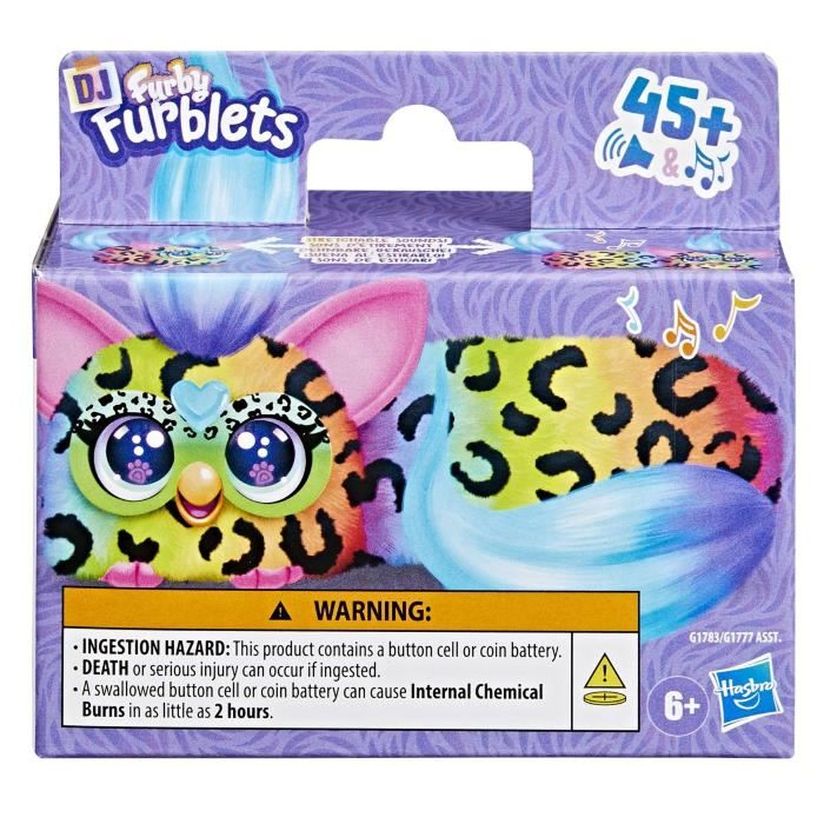 DJ Furby Furblets Spielzeugkiste mit buntem Leopardenmuster und Warnhinweis.