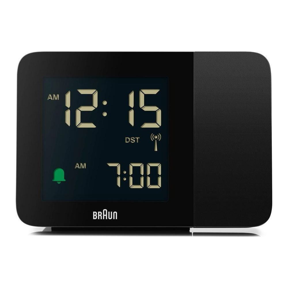 Réveil projecteur Braun noir affiche 12:15 et alarme à 7:00.