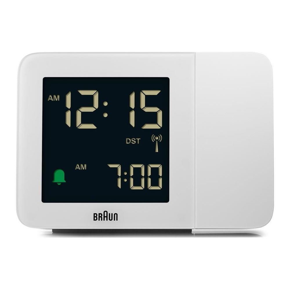 Horloge numérique affiche 12:15 et alarme 7:00. Logo Braun en bas.