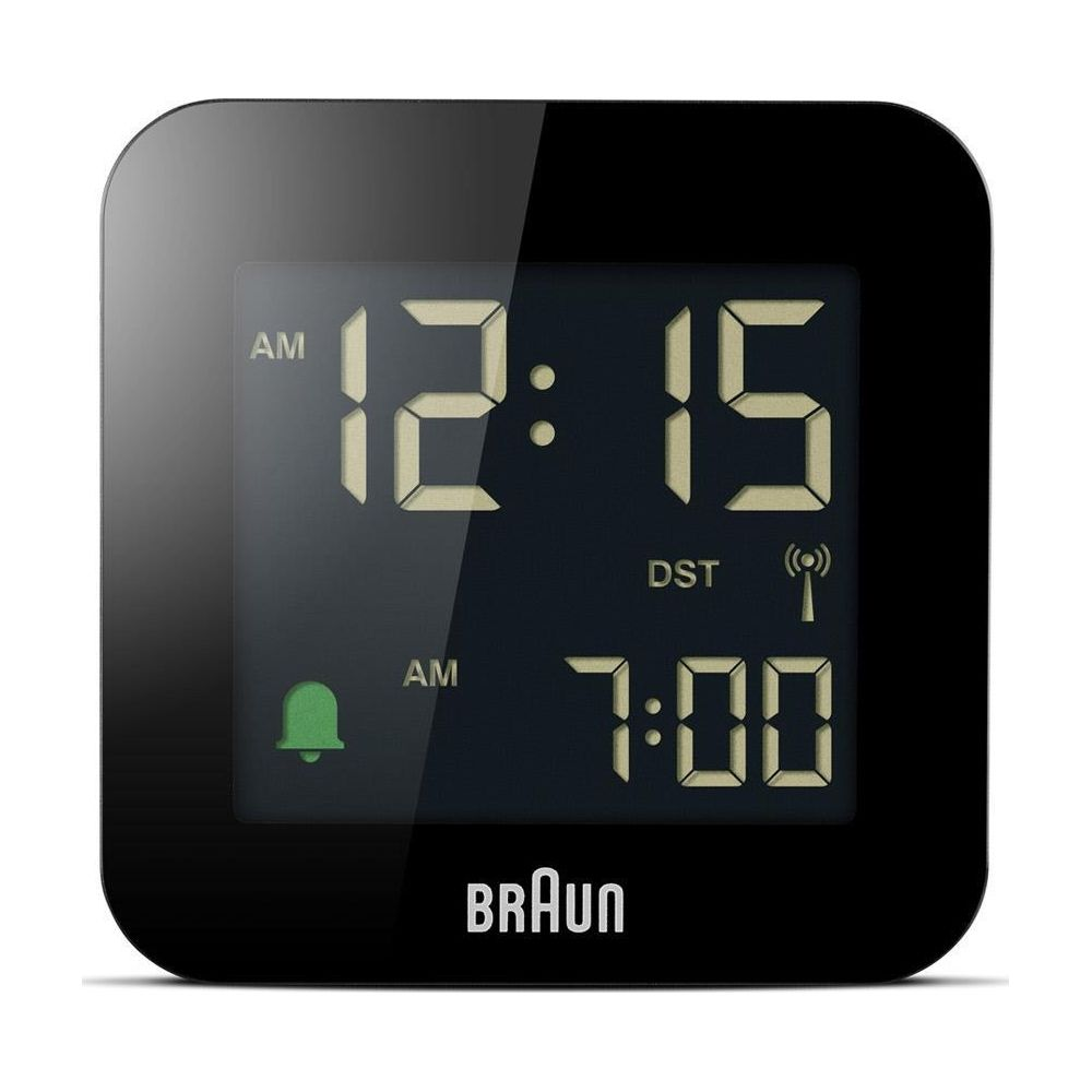 Réveil numérique noir affiche 12:15 et 7:00. Icône de cloche à gauche.