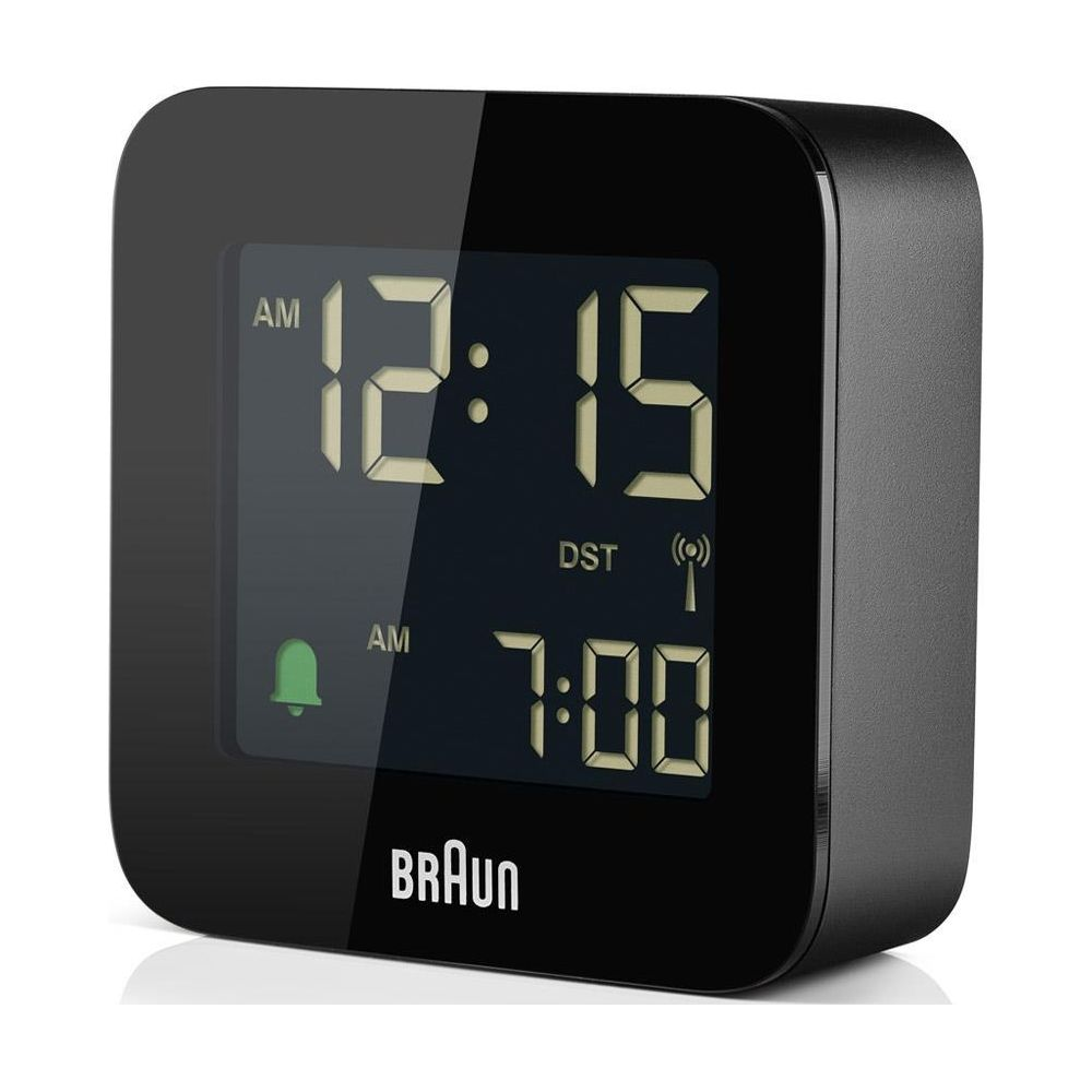Réveil numérique Braun noir affichant 12:15 et 7:00.