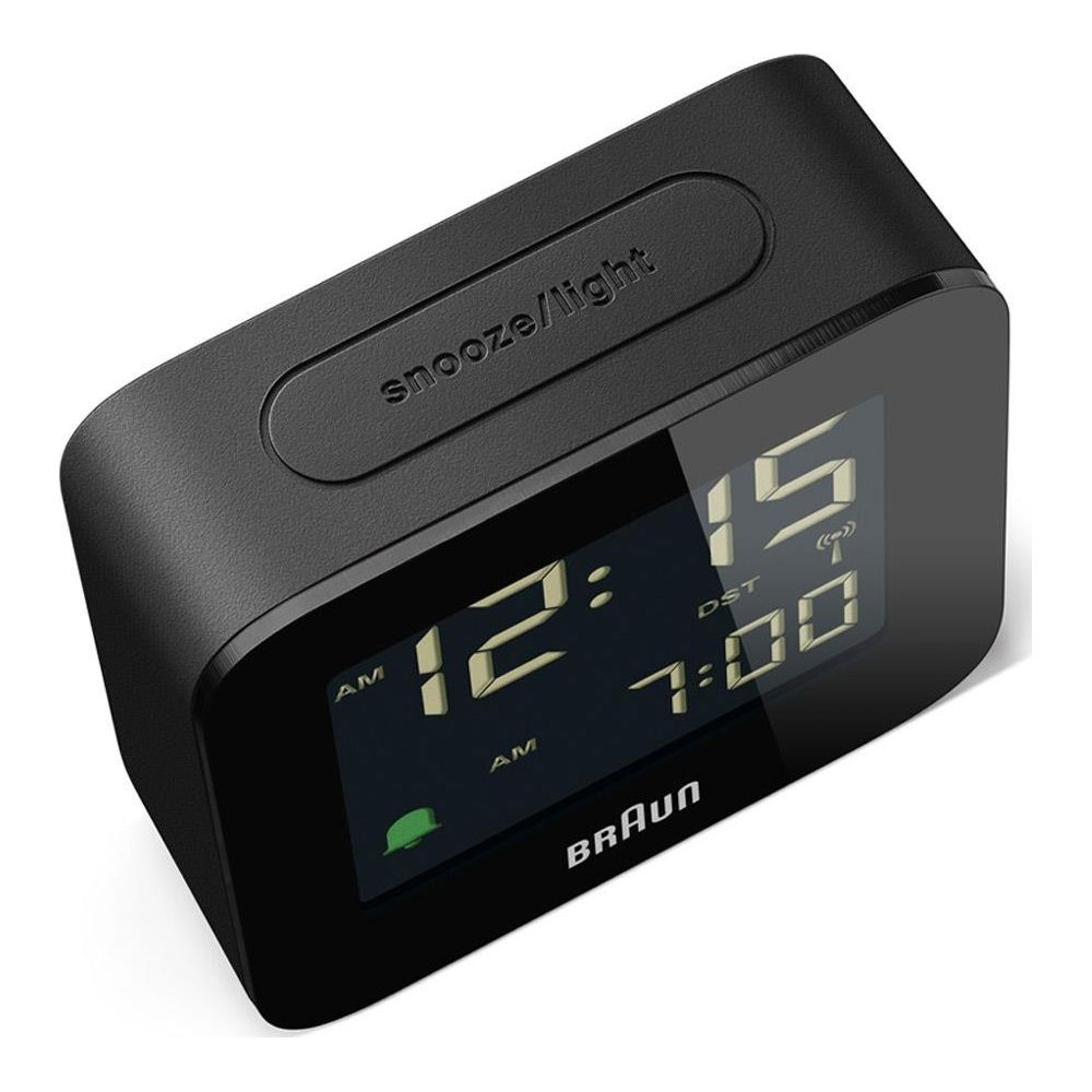 Réveil Braun noir avec bouton snooze/lumière et affichage numérique 12:00 AM.