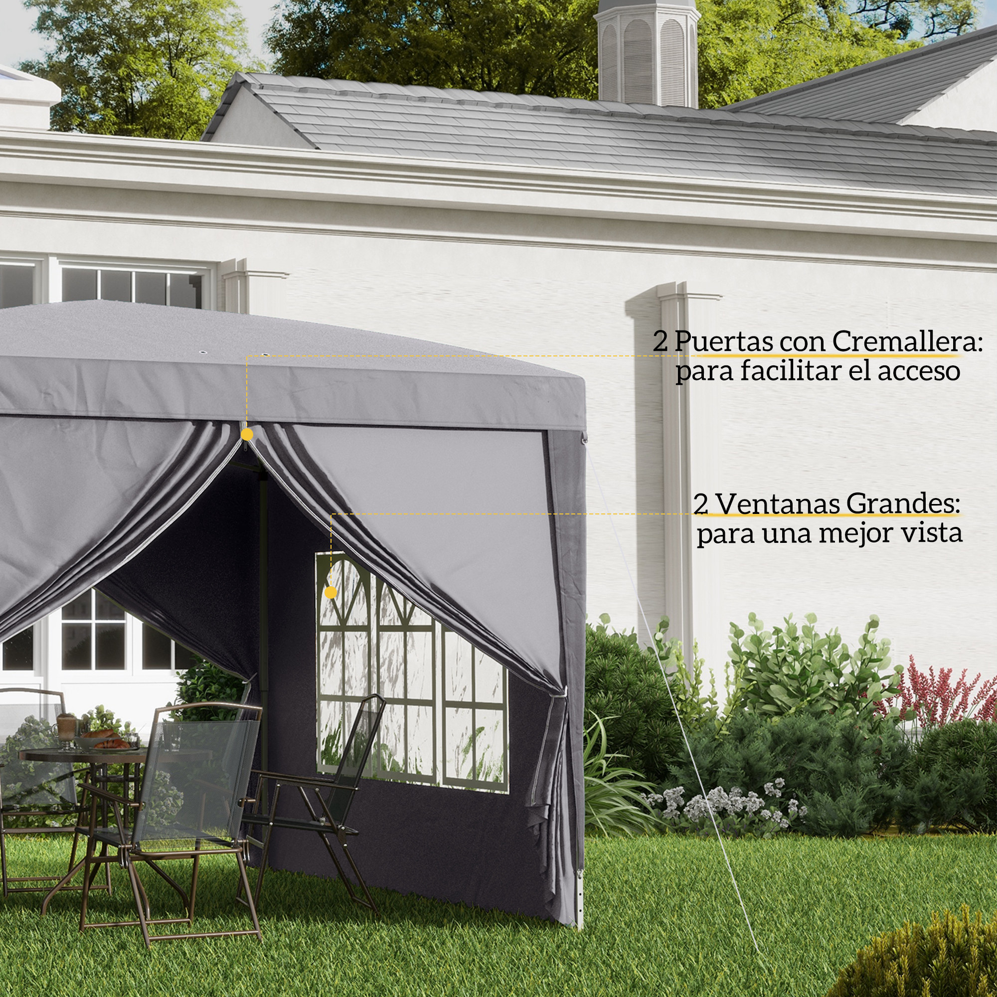 Carpa gris con mesa y sillas en jardín, con ventanas y puertas.