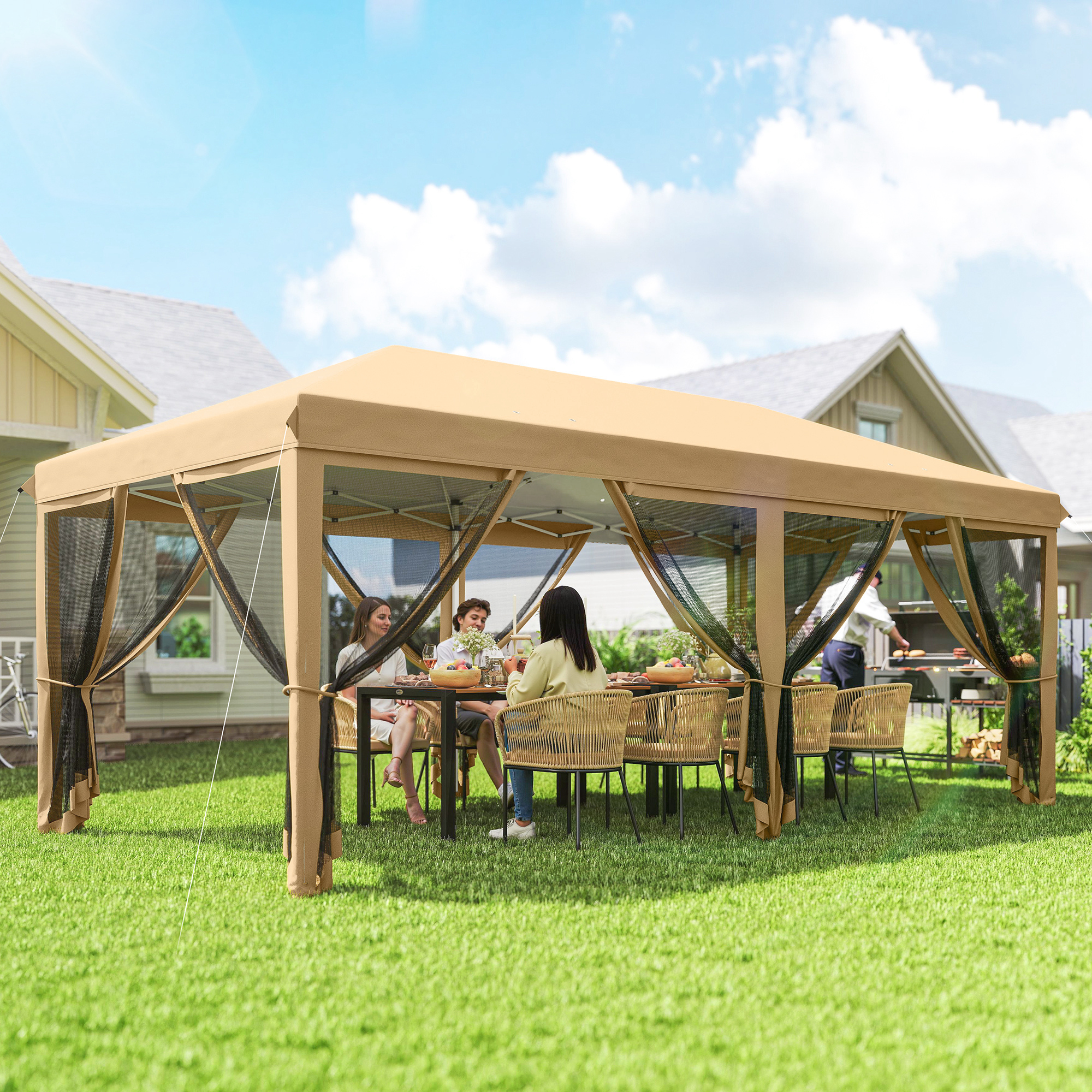 Una famiglia griglia sotto un gazebo color cuoio in un giardino.
