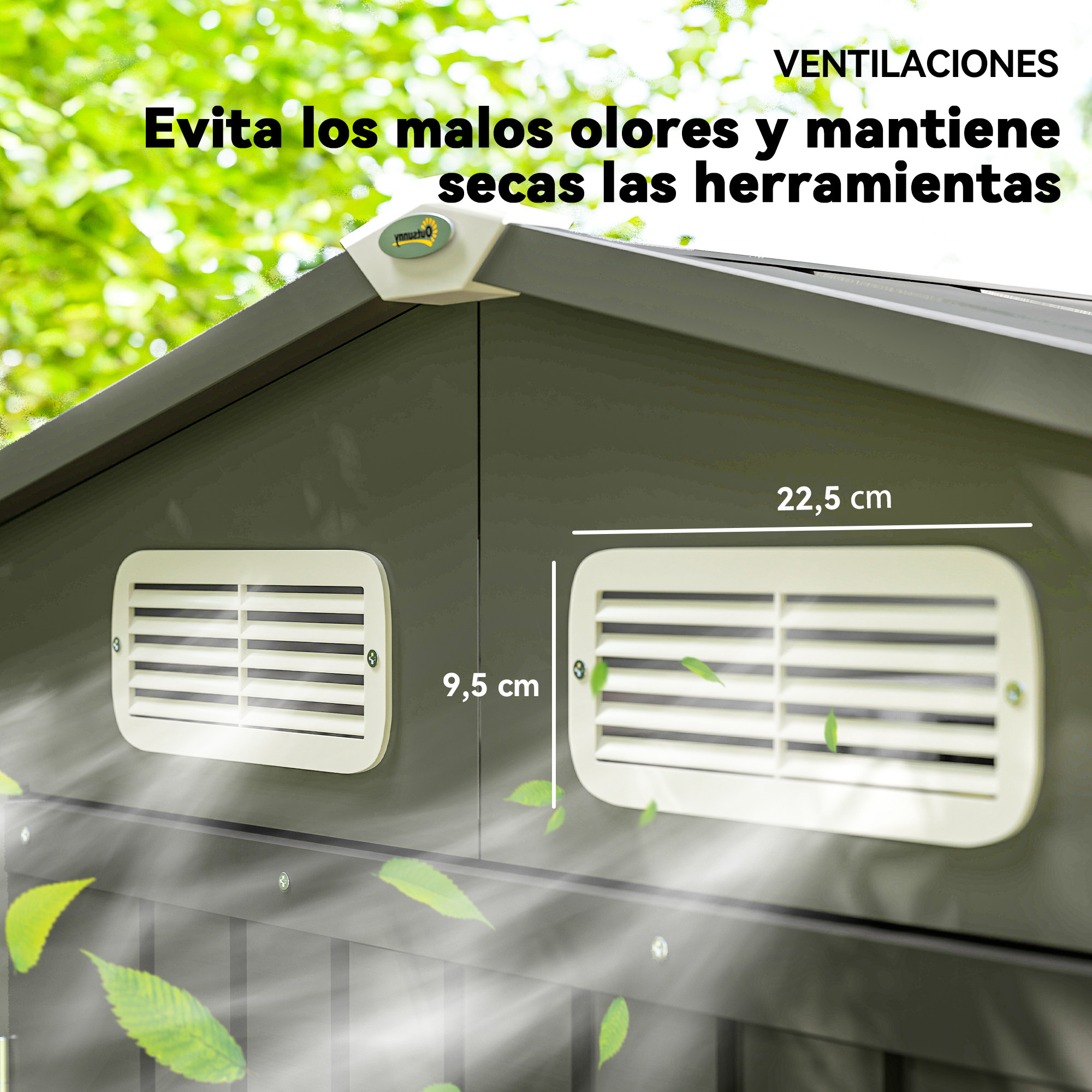 Cobertizo gris con rejillas de ventilación blancas y hojas al viento.