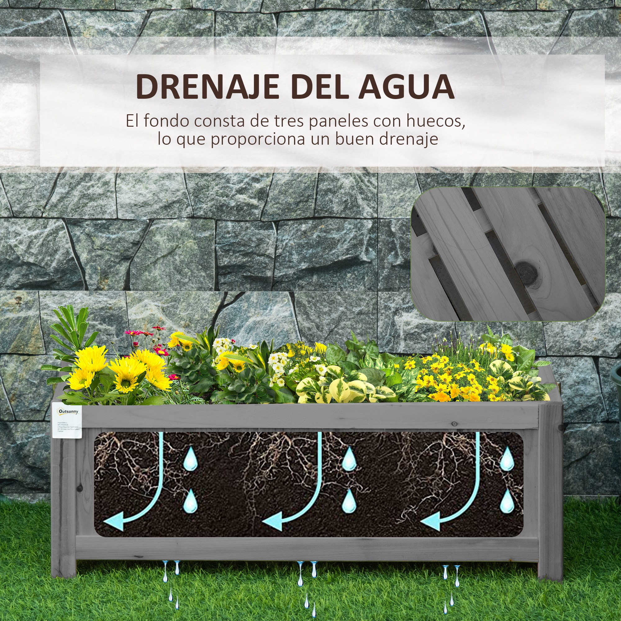 Un bancal elevado con flores y tierra, ilustrando el drenaje de agua.