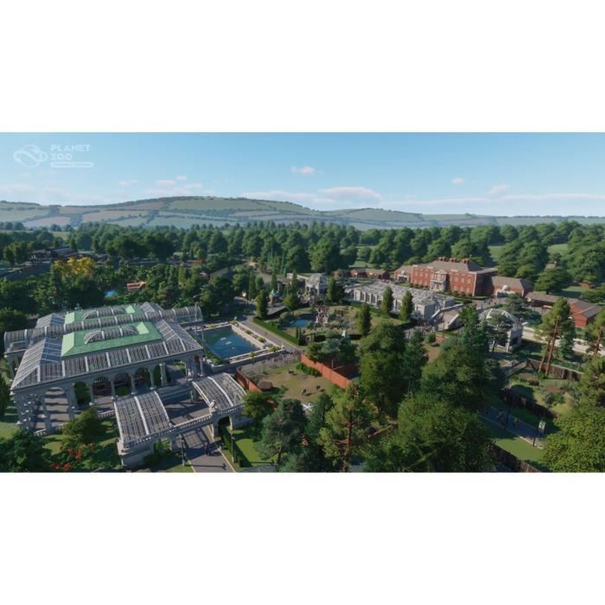 Un vasto zoo con un grande edificio di vetro, un edificio di mattoni rossi e alberi verdi.