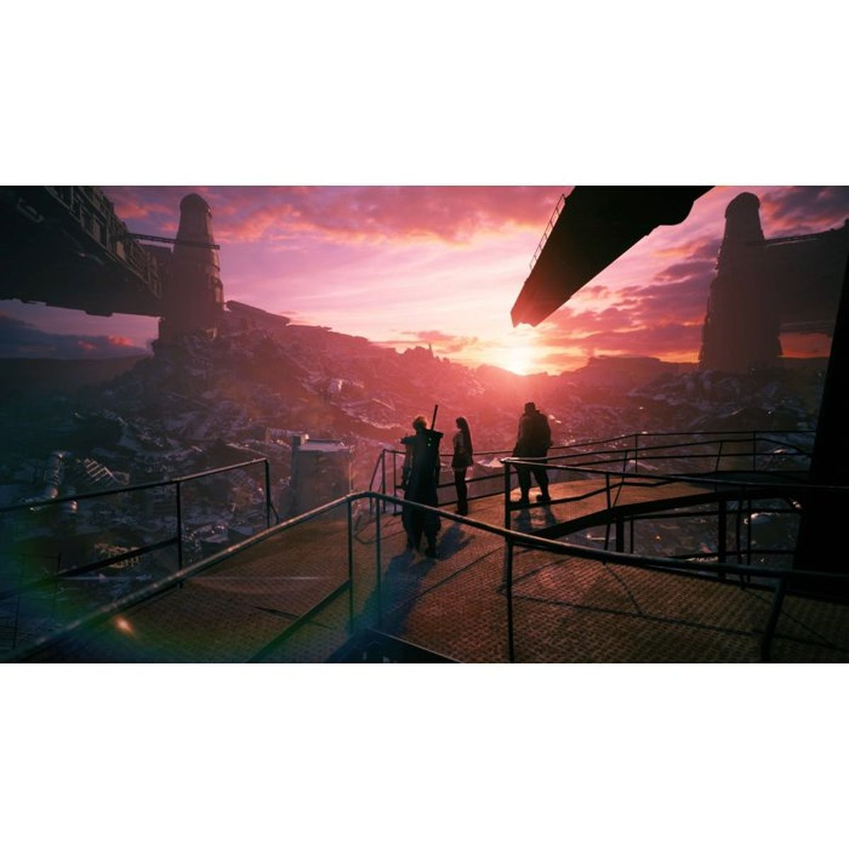 Trzy osoby na metalowej platformie patrzą na zrujnowane miasto o zachodzie słońca.