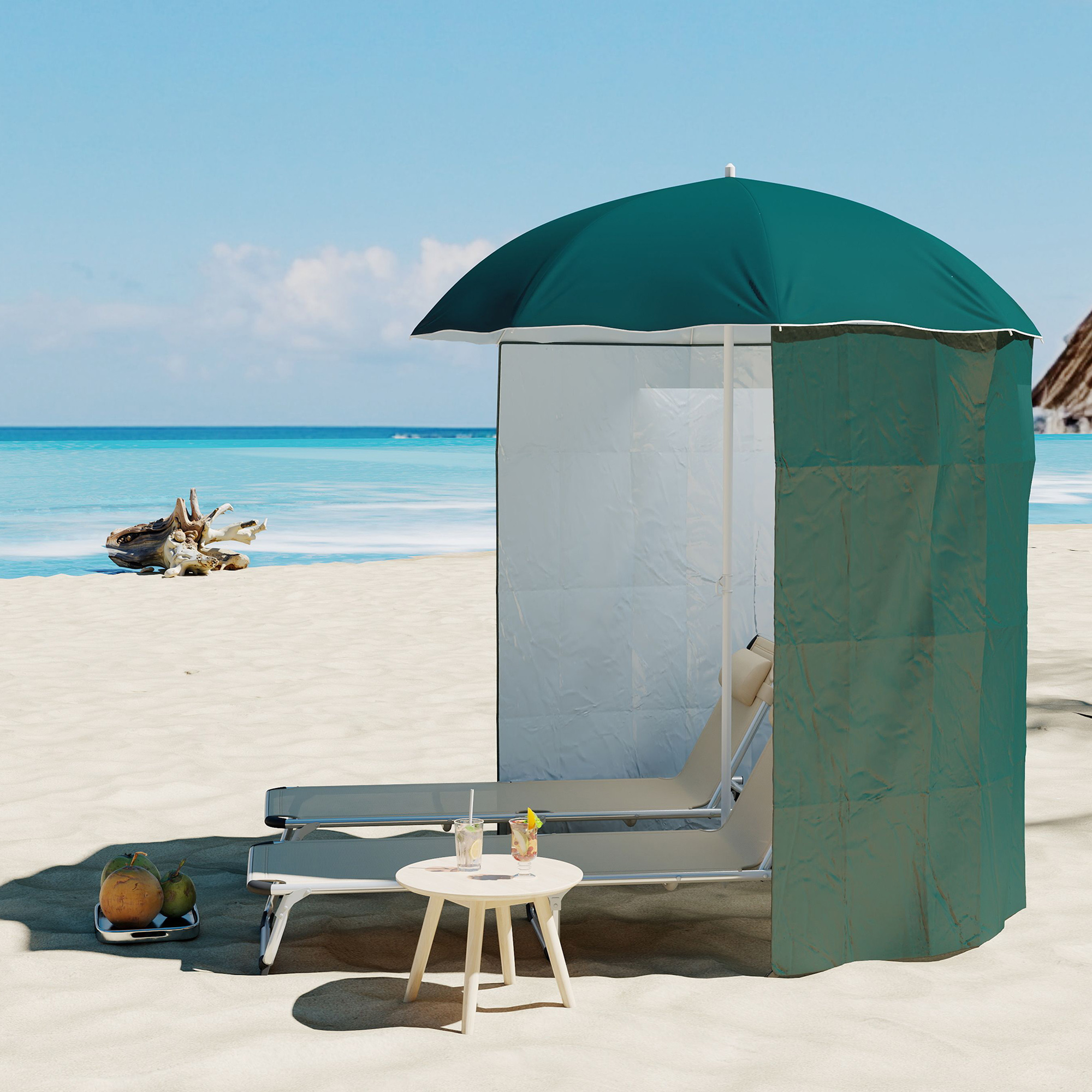 Cabina da spiaggia con lettini, tavolo, bevande e noci di cocco vicino al mare.