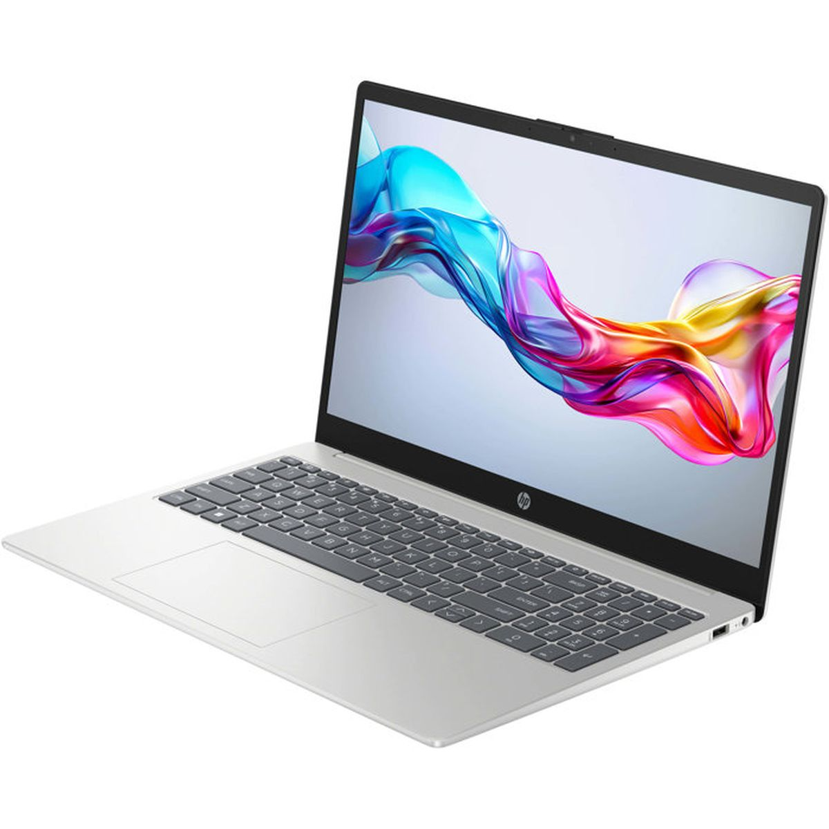 Srebrny laptop z kolorową abstrakcyjną tapetą na ekranie.