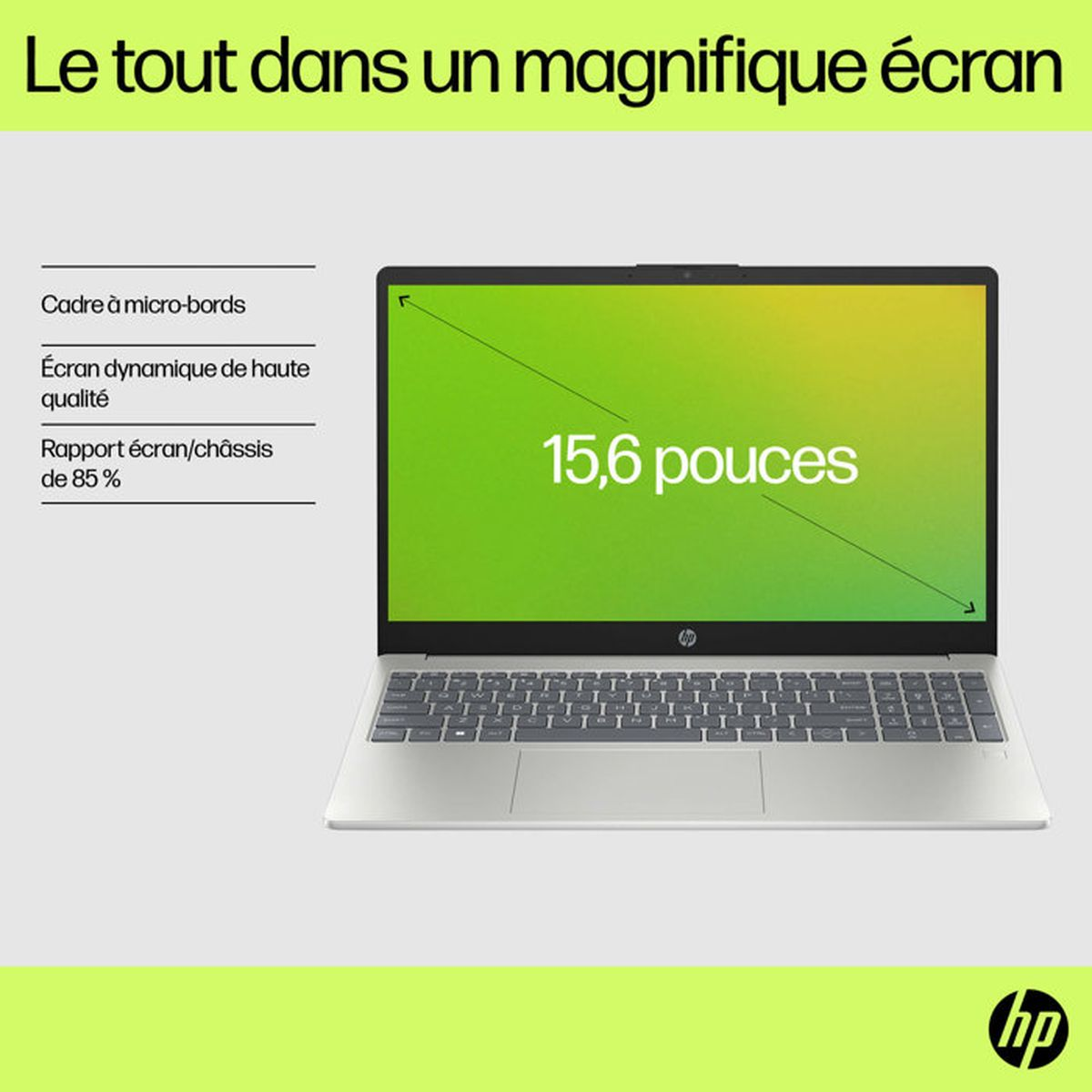 Srebrny laptop HP z ekranem 15,6 cala, mikramkami i zielonym tłem.