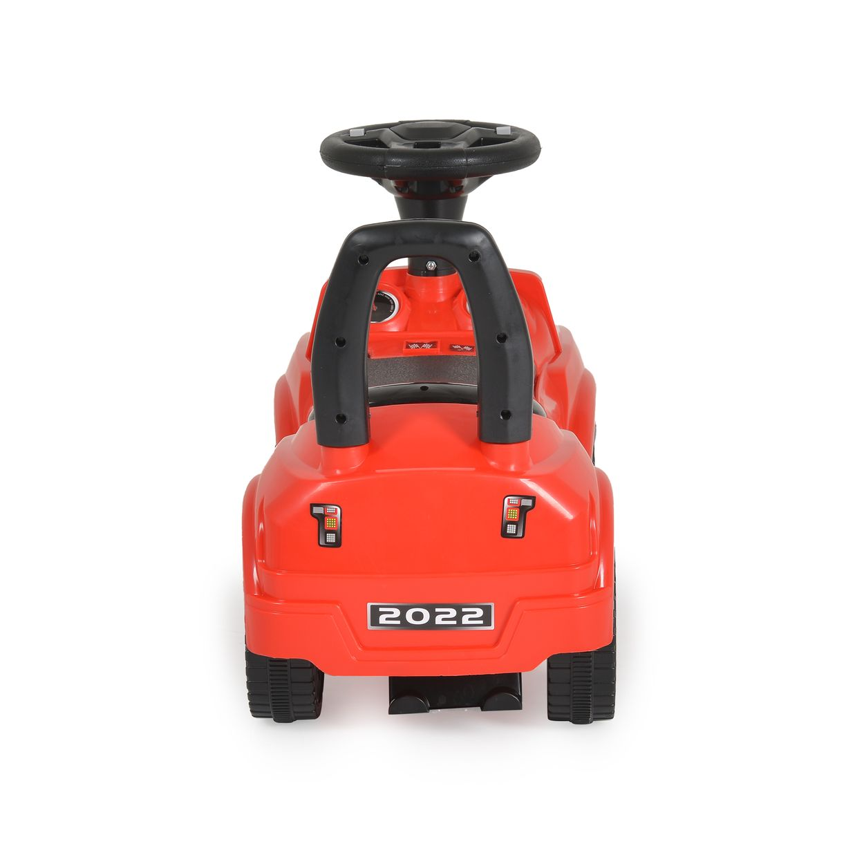 Ein rotes Spielzeugauto mit schwarzem Lenkrad und Griffen, Nummernschild 2022.