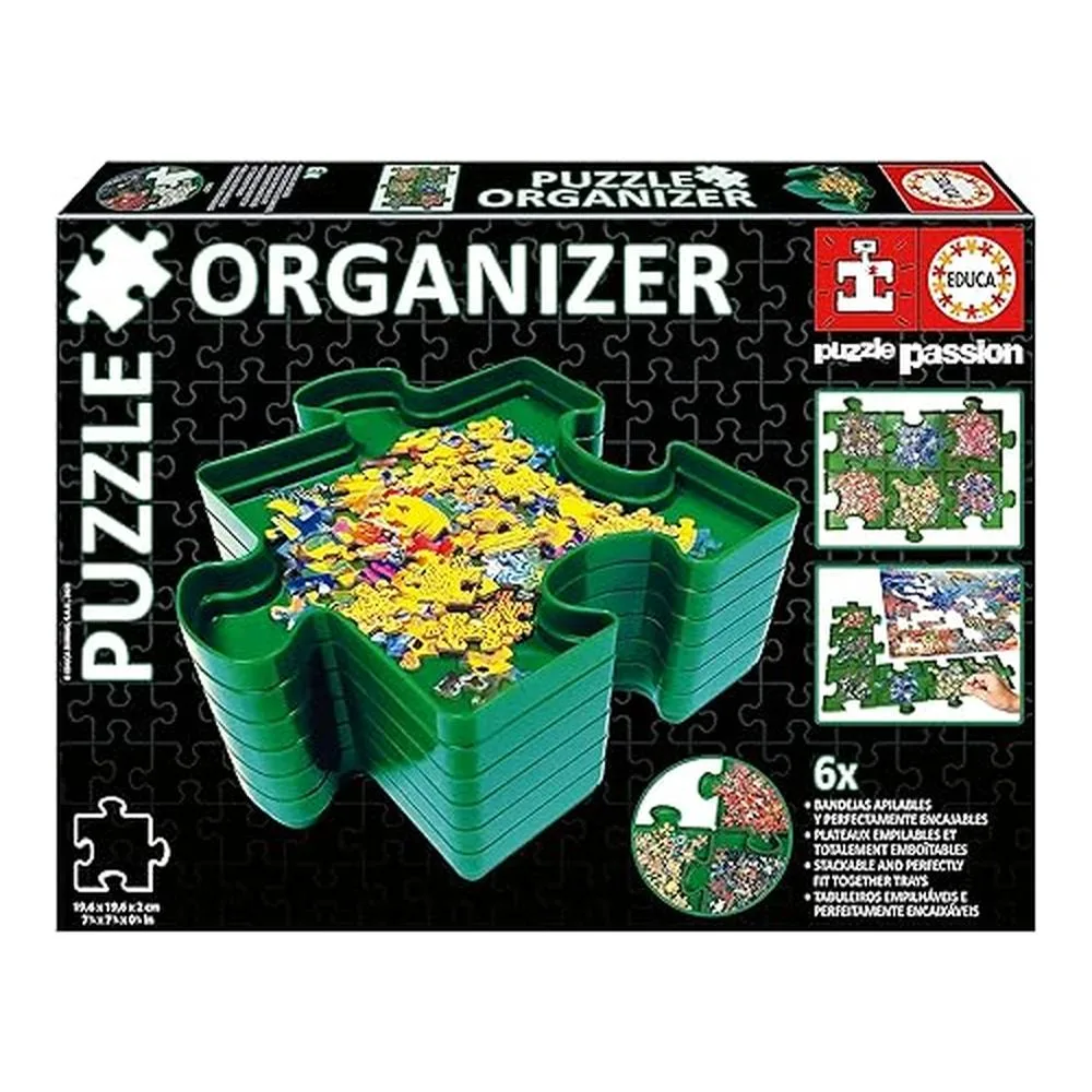 Ein grüner Puzzle-Organizer mit vielen bunten Puzzleteilen.