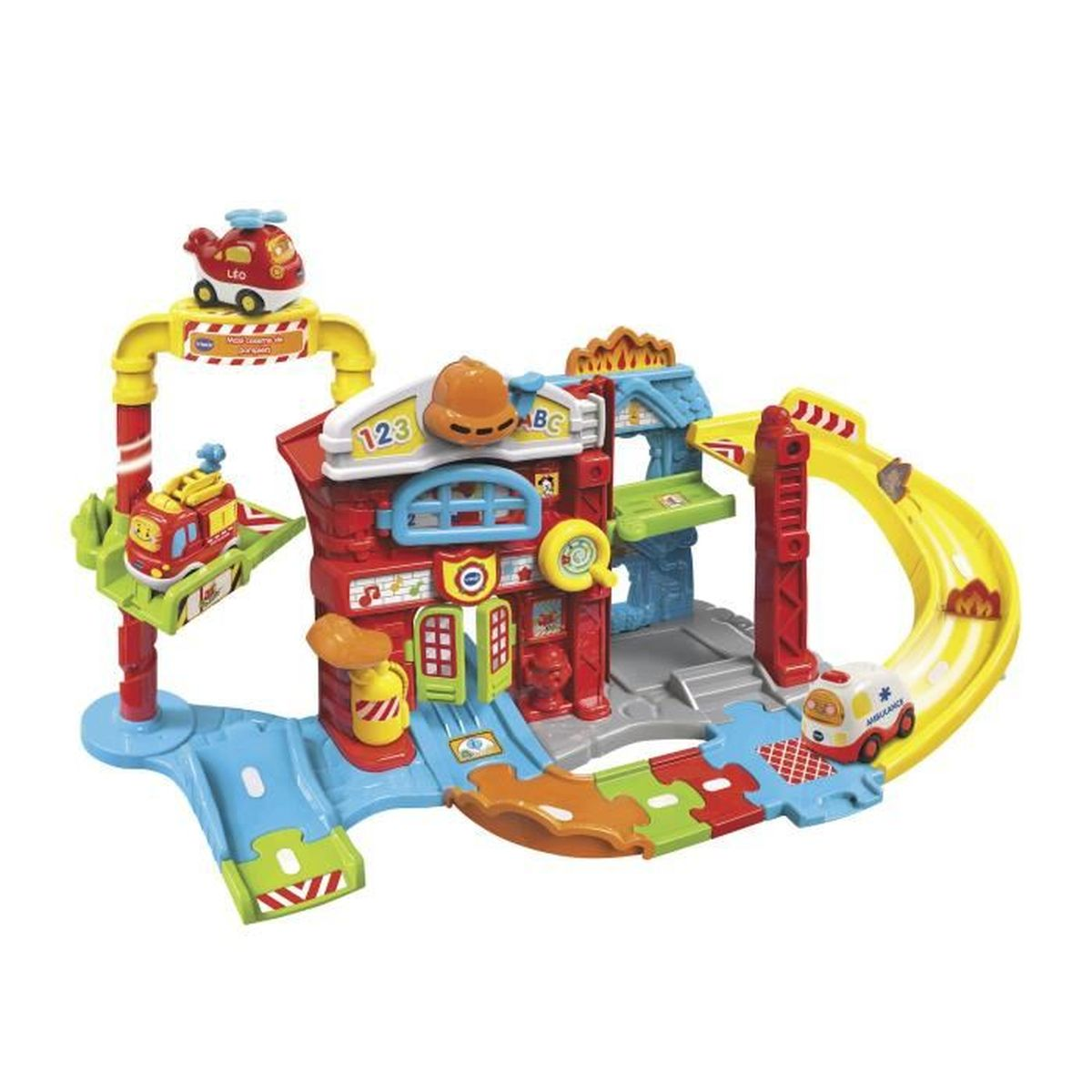 Ein buntes Spielzeug-Feuerwehrhaus mit Autos und Helikopter.