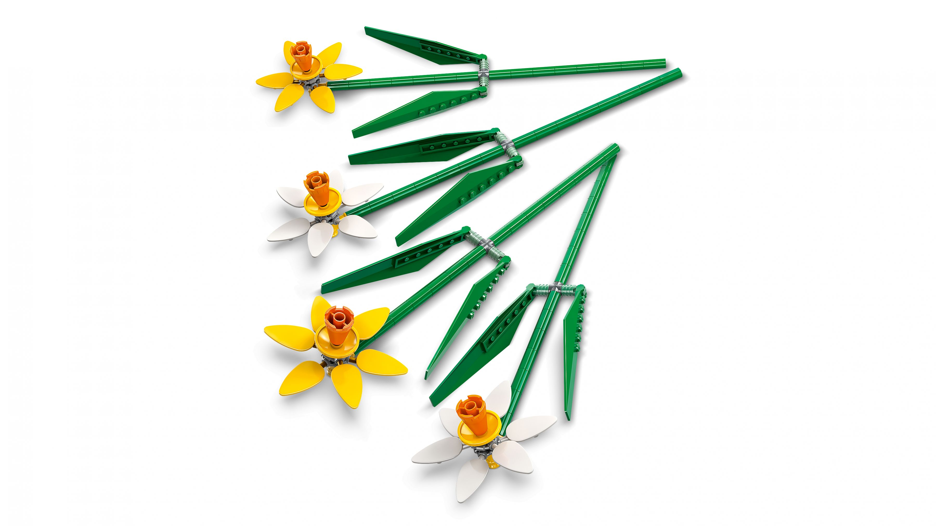 Bunte Blumen aus Bausteinen mit grünen Stielen auf weißem Hintergrund.