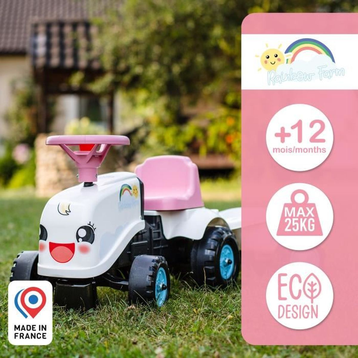 Ein weißer Spielzeugtraktor mit rosa Sitz und Lenkrad, auf Gras.