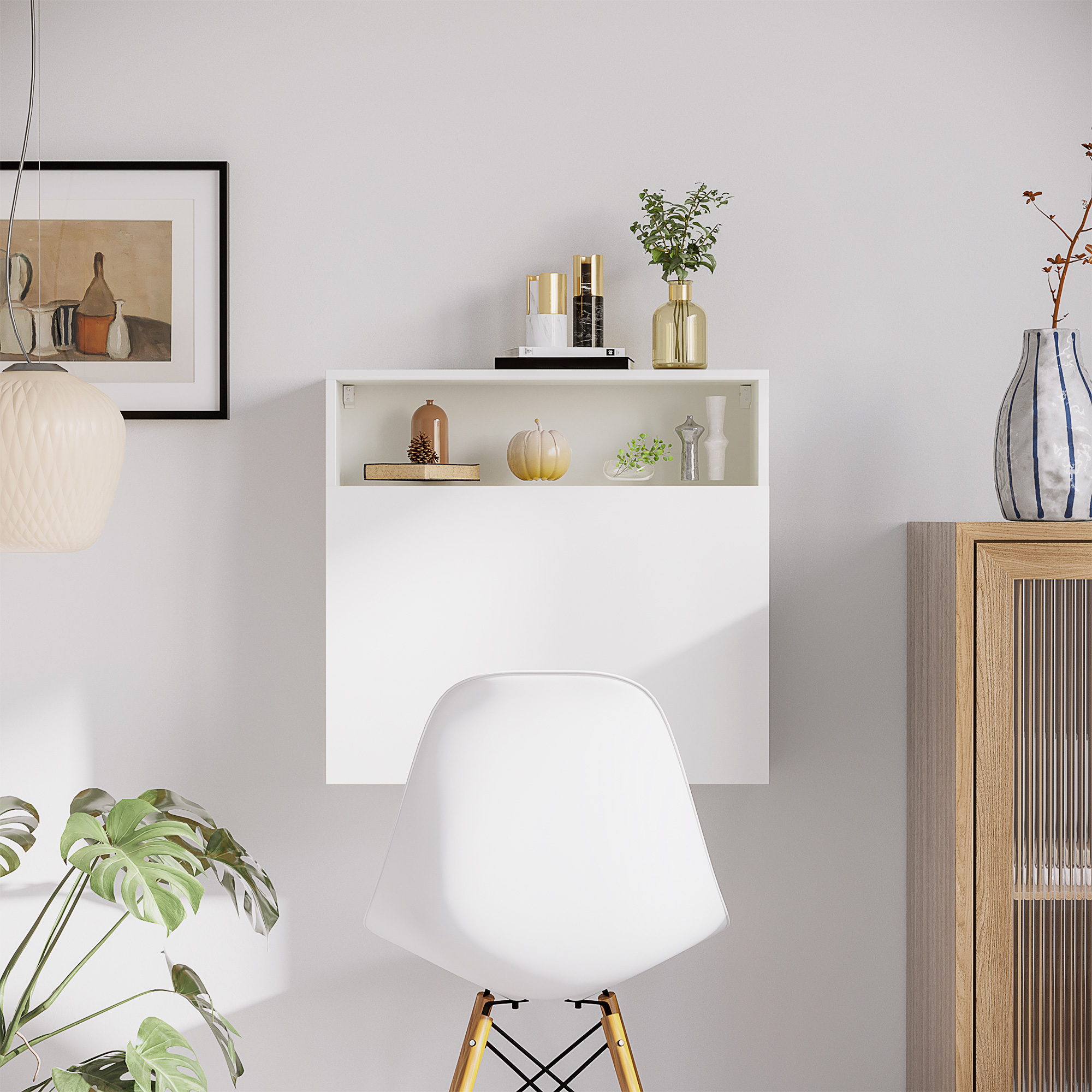 Un escritorio blanco de pared con una silla blanca delante, un armario al lado.