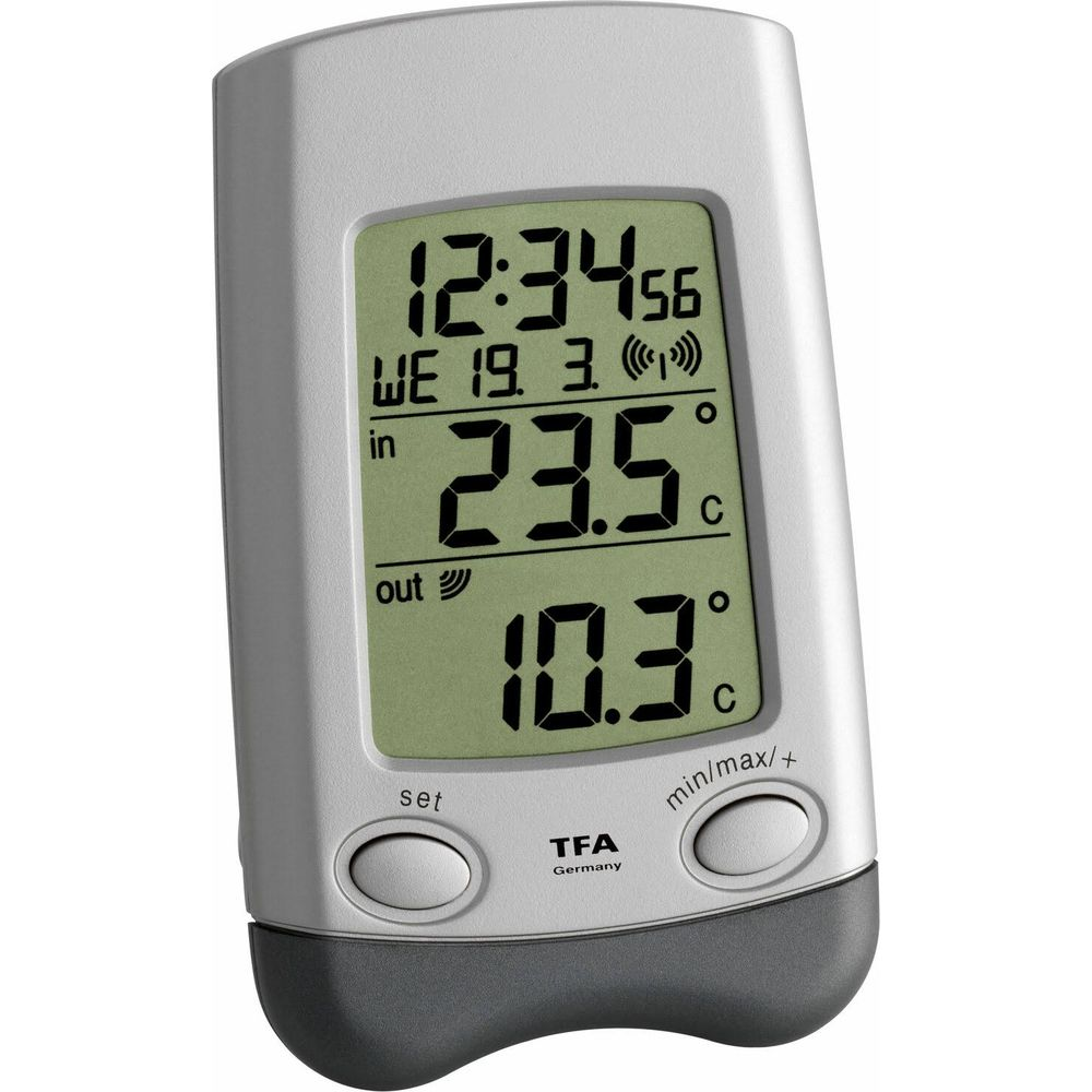 Thermomètre numérique affiche 12:34, 19.3., temp int 23.5C, temp ext 10.3C.