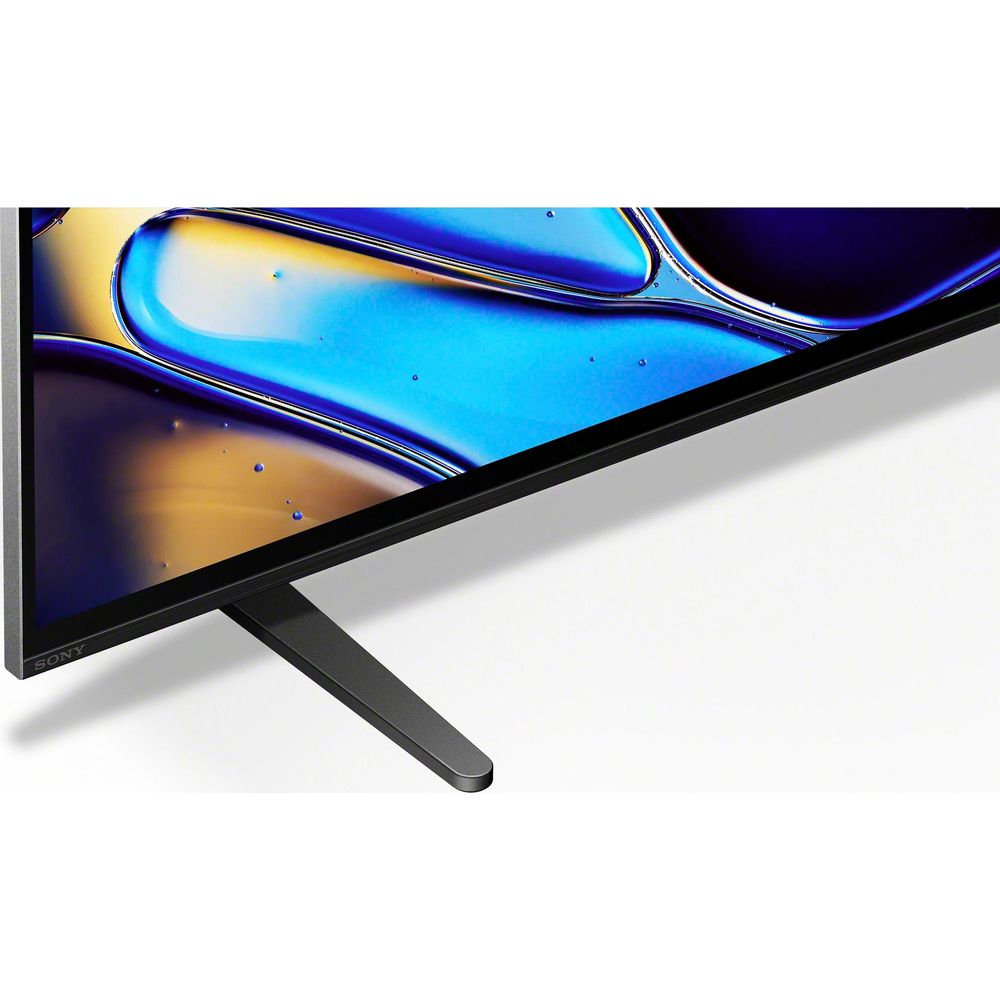 Nahaufnahme eines Fernsehers mit einem blauen und gelben Bild auf dem Bildschirm und einem schwarzen Ständer.