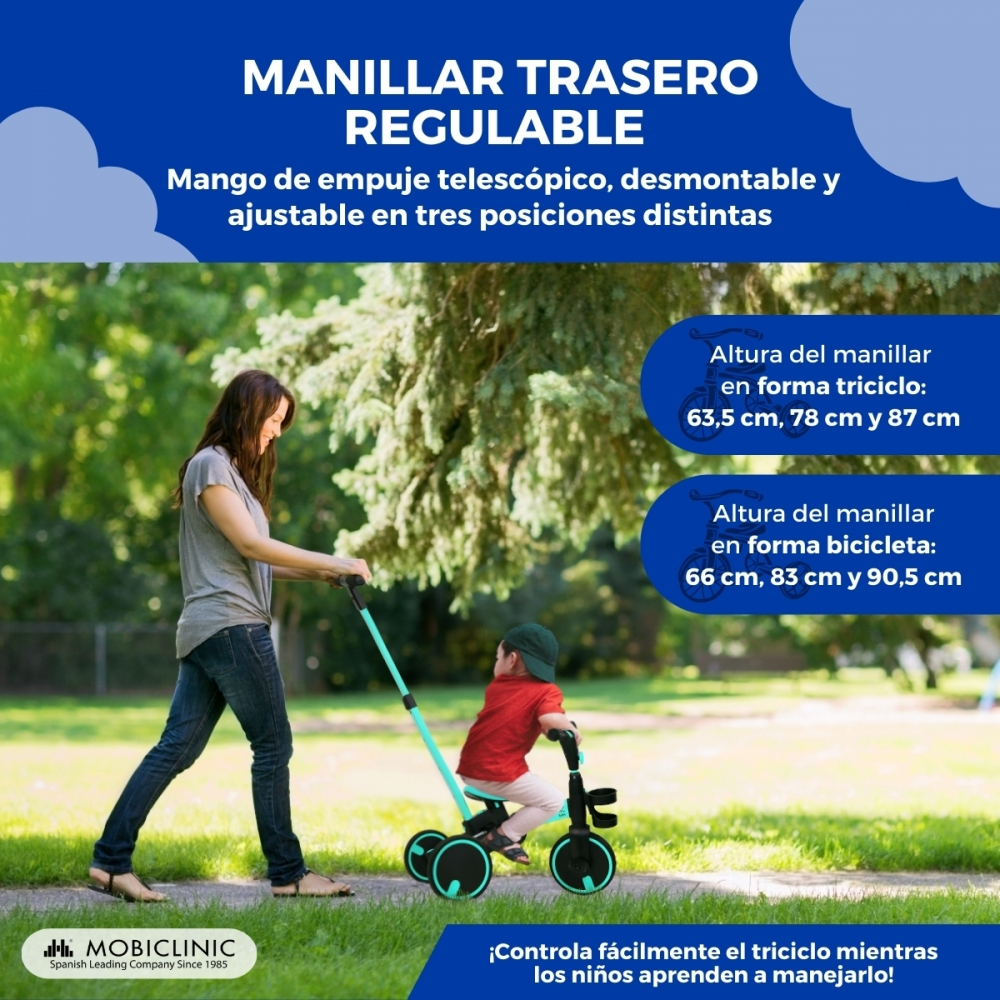 Mujer empuja a niño en triciclo en parque con manillar ajustable. Detalles.