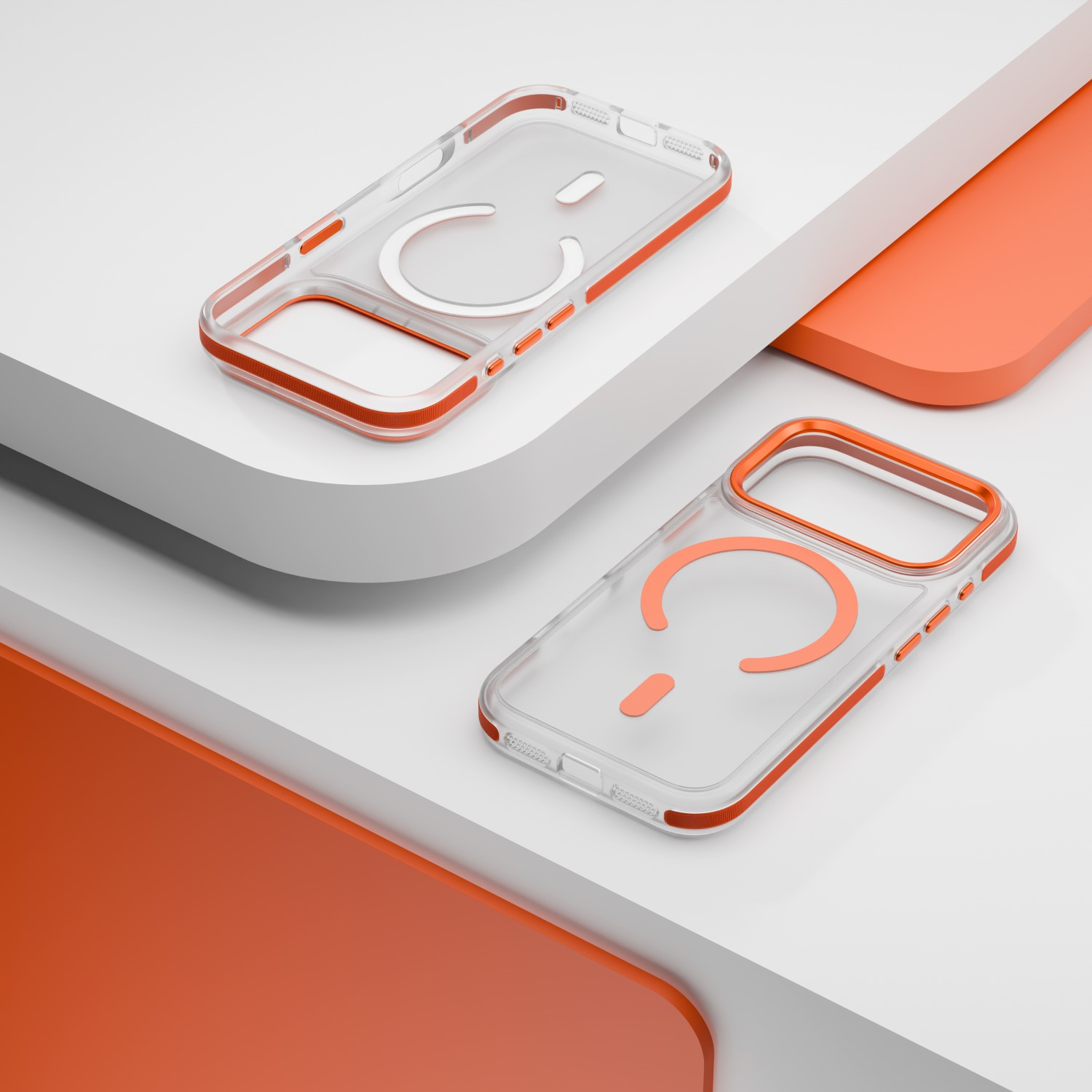 Dwa przezroczyste etui na telefon z pomarańczowymi akcentami leżą na białych platformach.