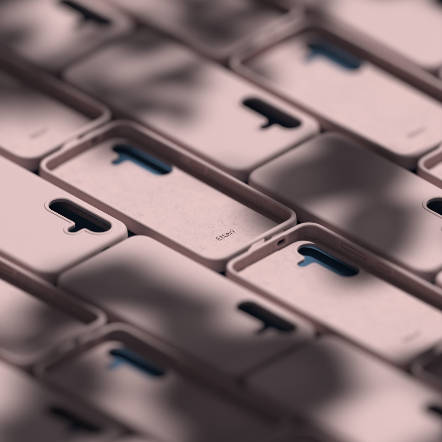 Molte custodie per telefoni rosa polveroso sono disposte fianco a fianco, alcune con fodera blu.