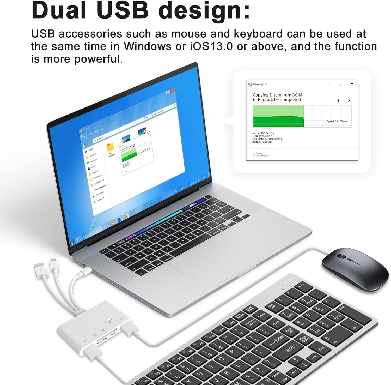 Laptop mit USB-Hub, Tastatur und Maus, zeigt Dateiübertragung an.